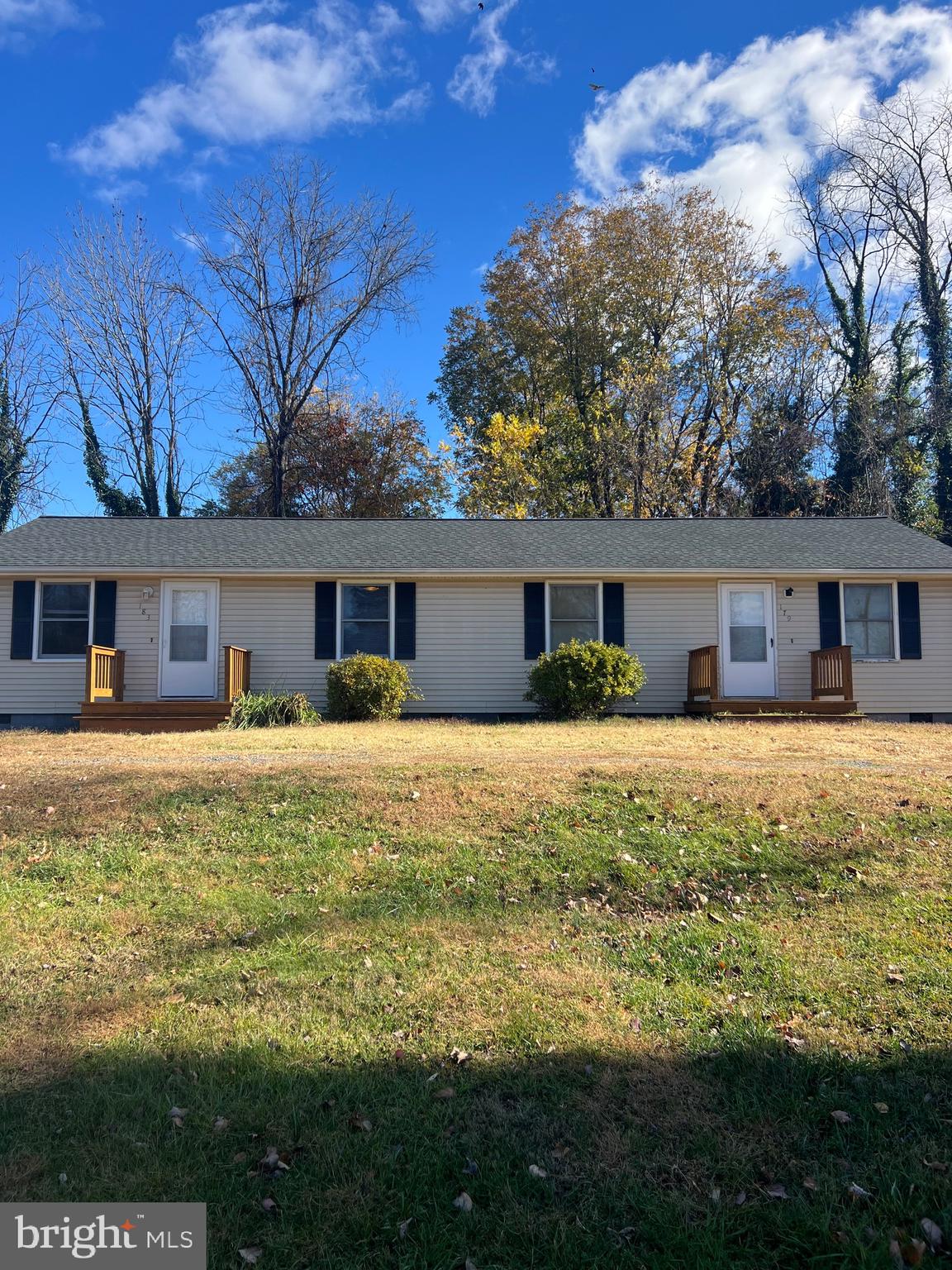 183 North Almond Street, Unit 183 Orange, VA 22960 - Photo 6 of 10 a front view of house with a garden and deck
