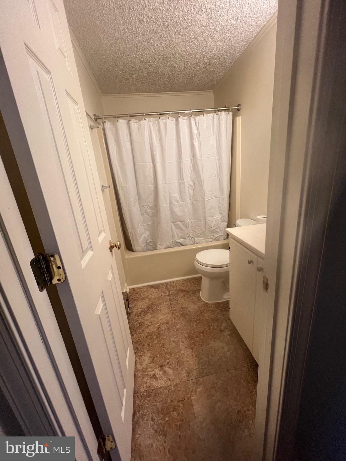 183 North Almond Street, Unit 183 Orange, VA 22960 - Photo 8 of 10 a bathroom with a toilet and a shower