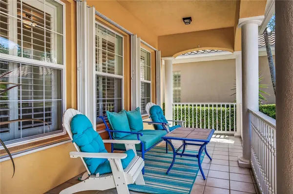 a view of a entryway door with furniture