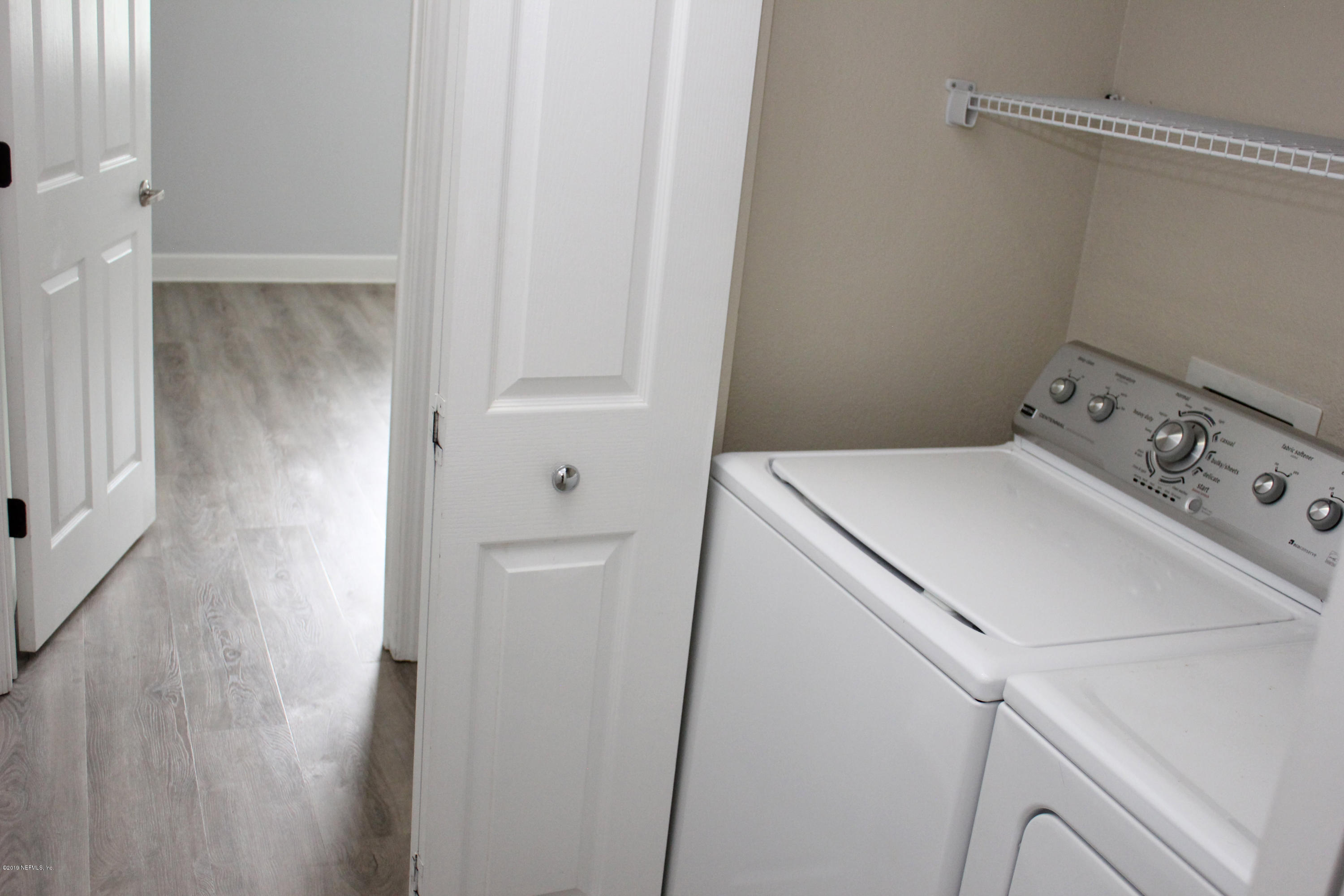 9745 Touchton Road, Unit 1323 Jacksonville, FL 32246 - Photo 13 of 19 a utility room with dryer and washer