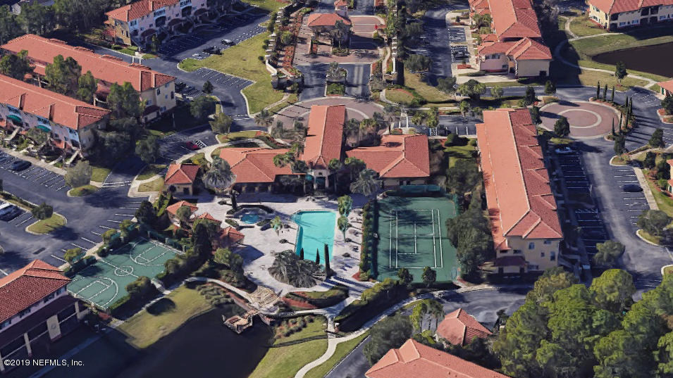 9745 Touchton Road, Unit 1323 Jacksonville, FL 32246 - Photo 19 of 19 an aerial view of houses with outdoor space