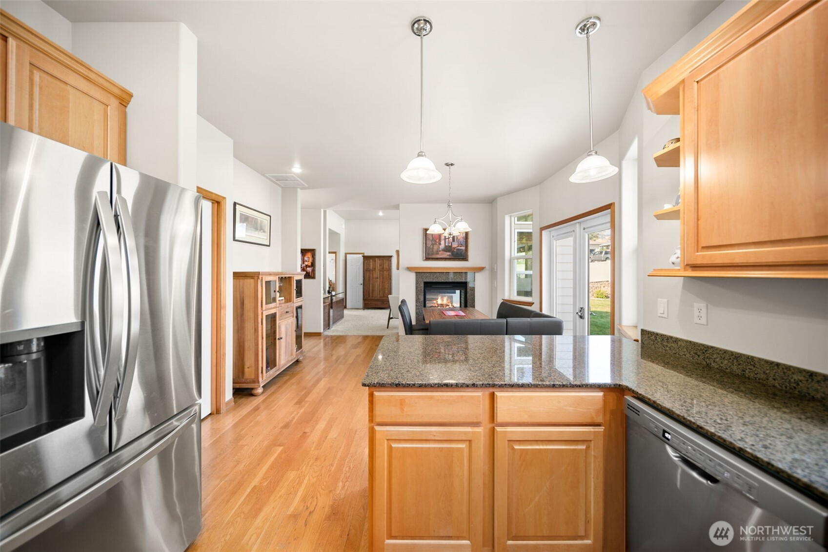 194 Lilly Lane Wenatchee, WA 98801 - Photo 17 of 37 a kitchen with stainless steel appliances granite countertop a refrigerator a stove a sink and a refrigerator