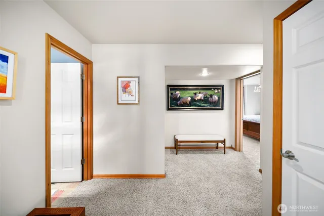 a view of a livingroom with furniture and a flat screen tv
