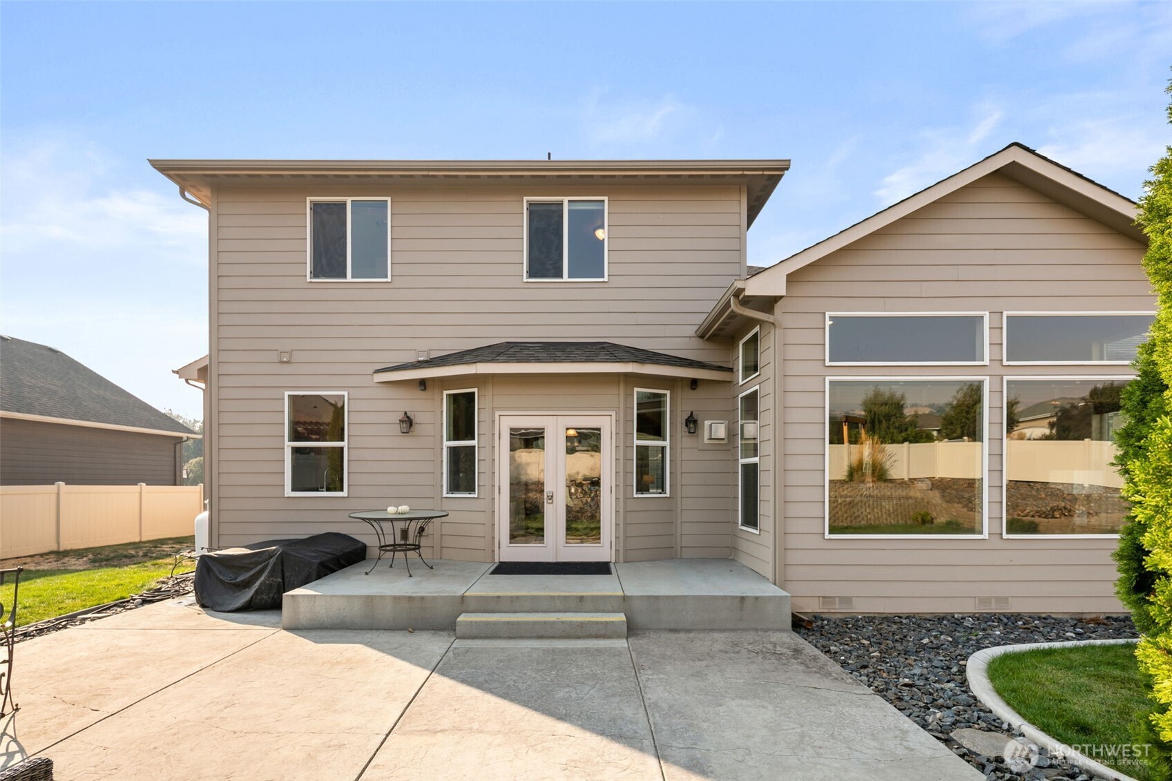 194 Lilly Lane Wenatchee, WA 98801 - Photo 32 of 37 a view of a house with a patio