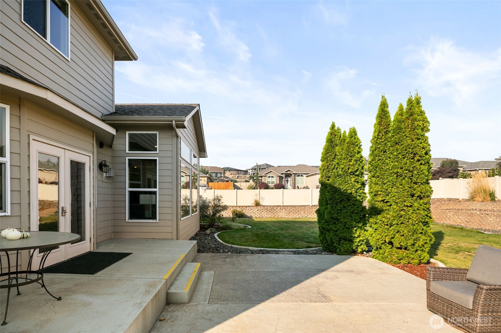 194 Lilly Lane Wenatchee, WA 98801 - Photo 33 of 37 a view of a backyard with sitting area