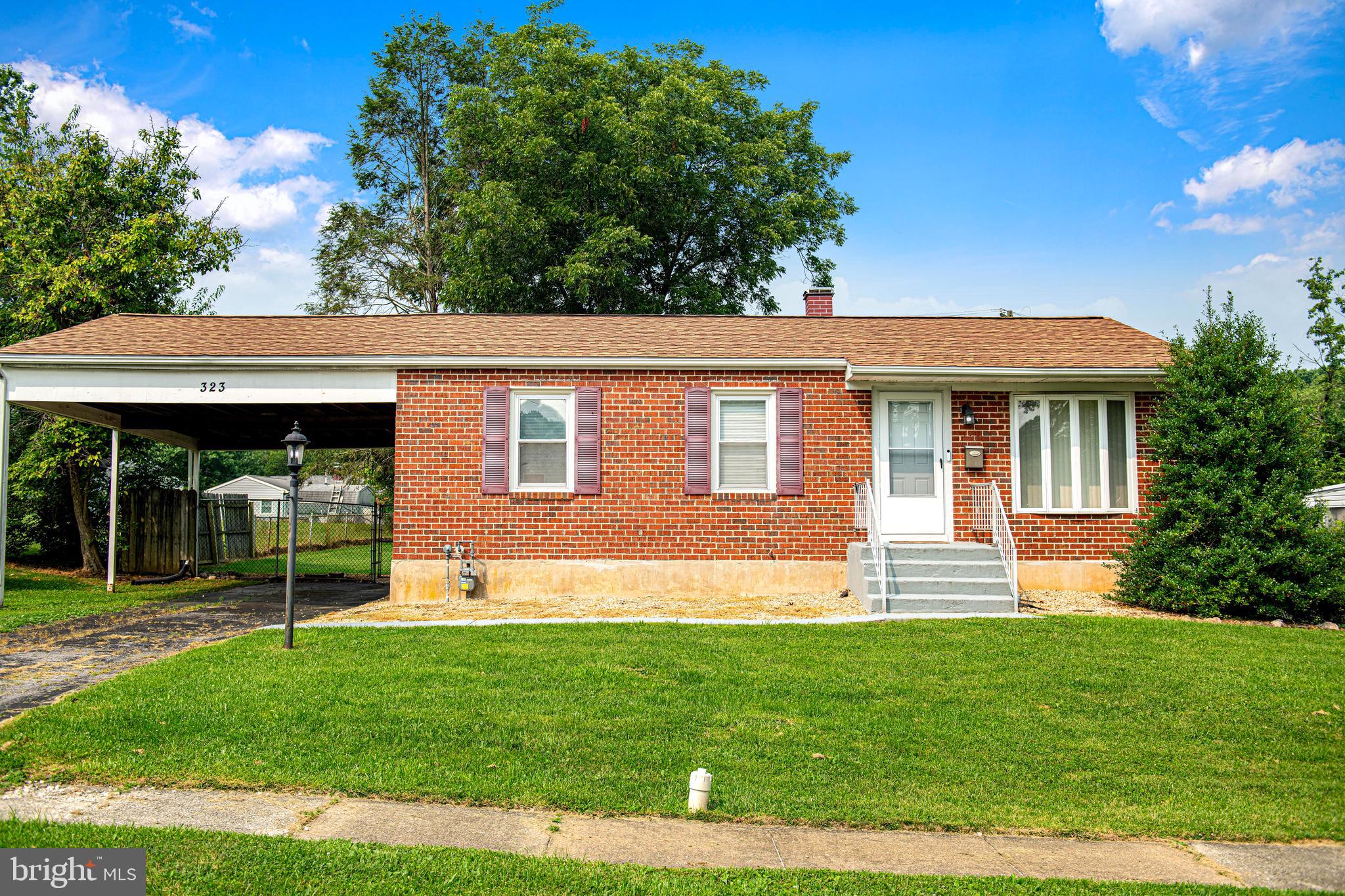 323 Walgrove Road Reisterstown, MD 21136 - Photo 1 of 26 Brick rancher with carport in Suburbia!