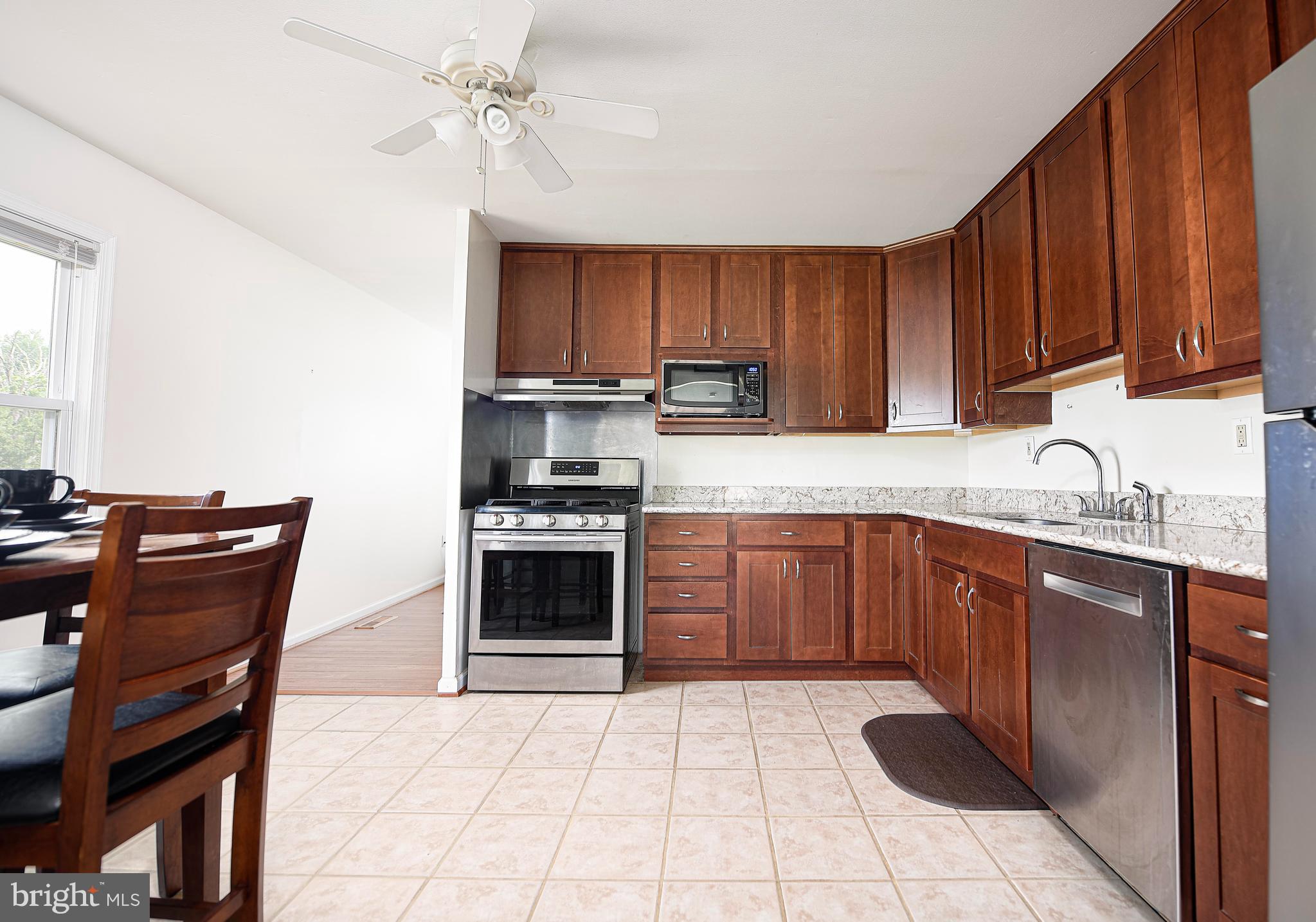 323 Walgrove Road Reisterstown, MD 21136 - Photo 8 of 26 Open kitchen with SS appliances