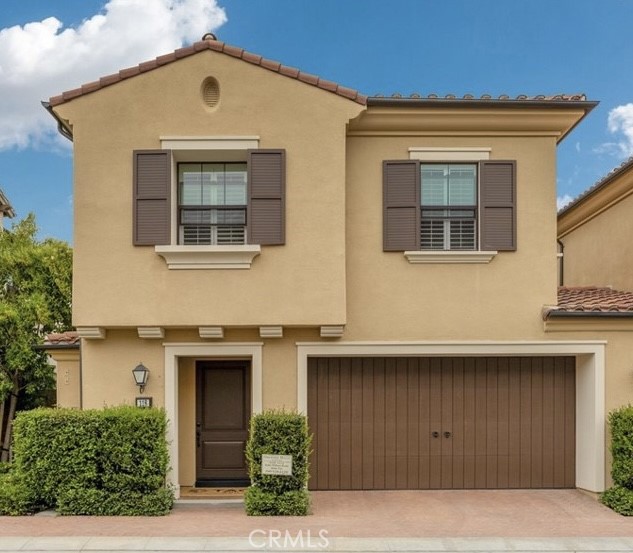 118 Working Ranch Irvine, CA 92602 - Photo 1 of 1 a front view of a house with garage