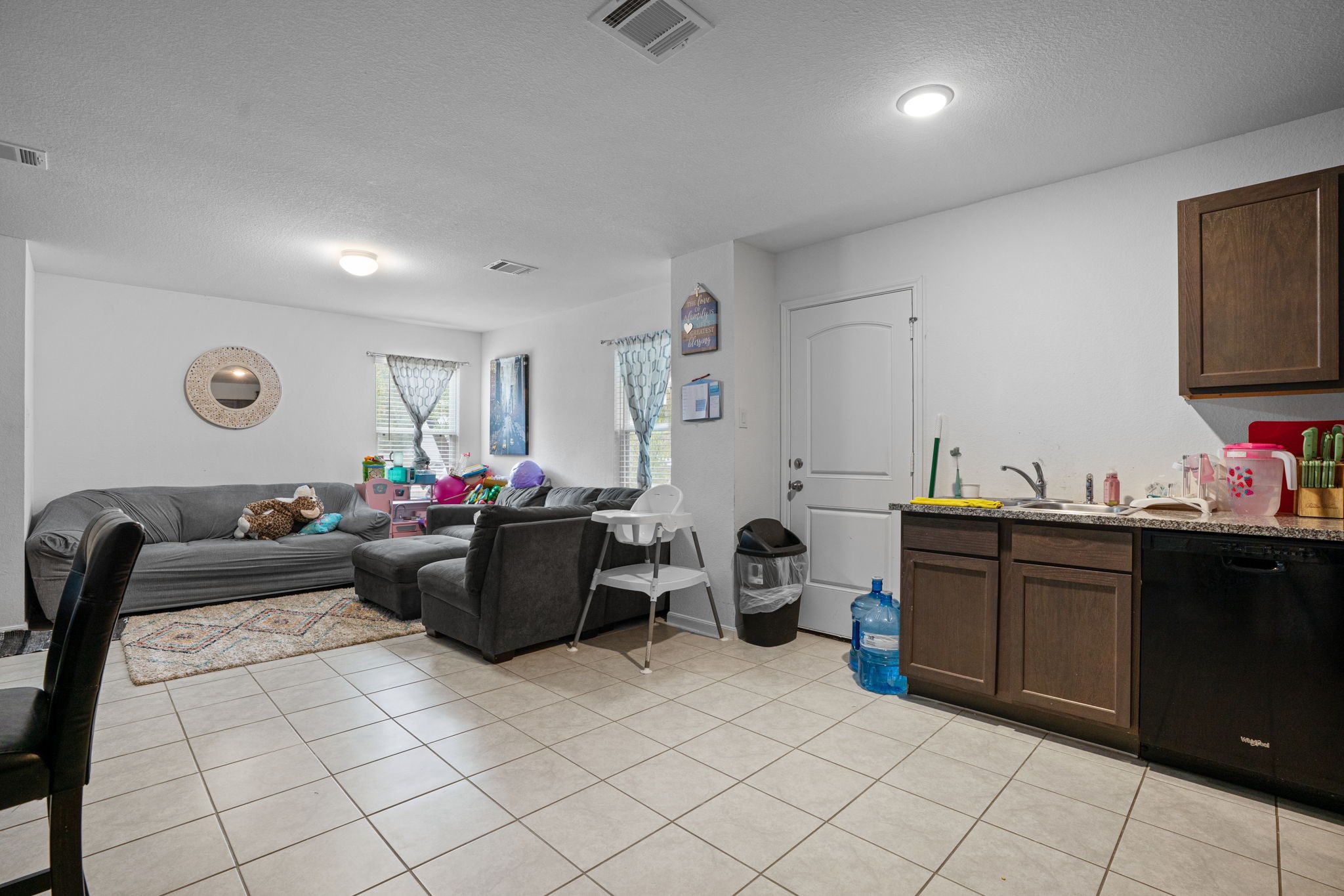28612 Rantoul Court Point Blank, TX 77364 - Photo 6 of 20 a living room with furniture and a flat screen tv