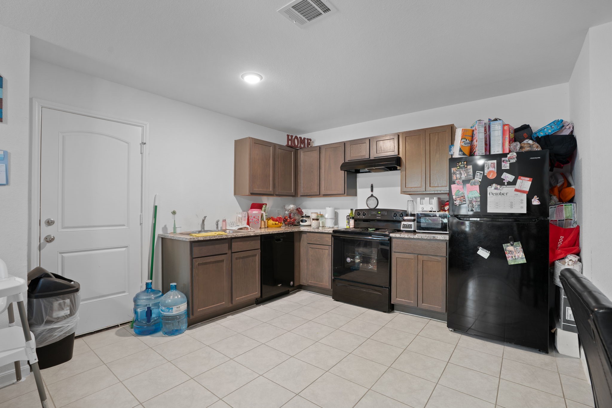 28612 Rantoul Court Point Blank, TX 77364 - Photo 8 of 20 a kitchen with a sink and cabinets