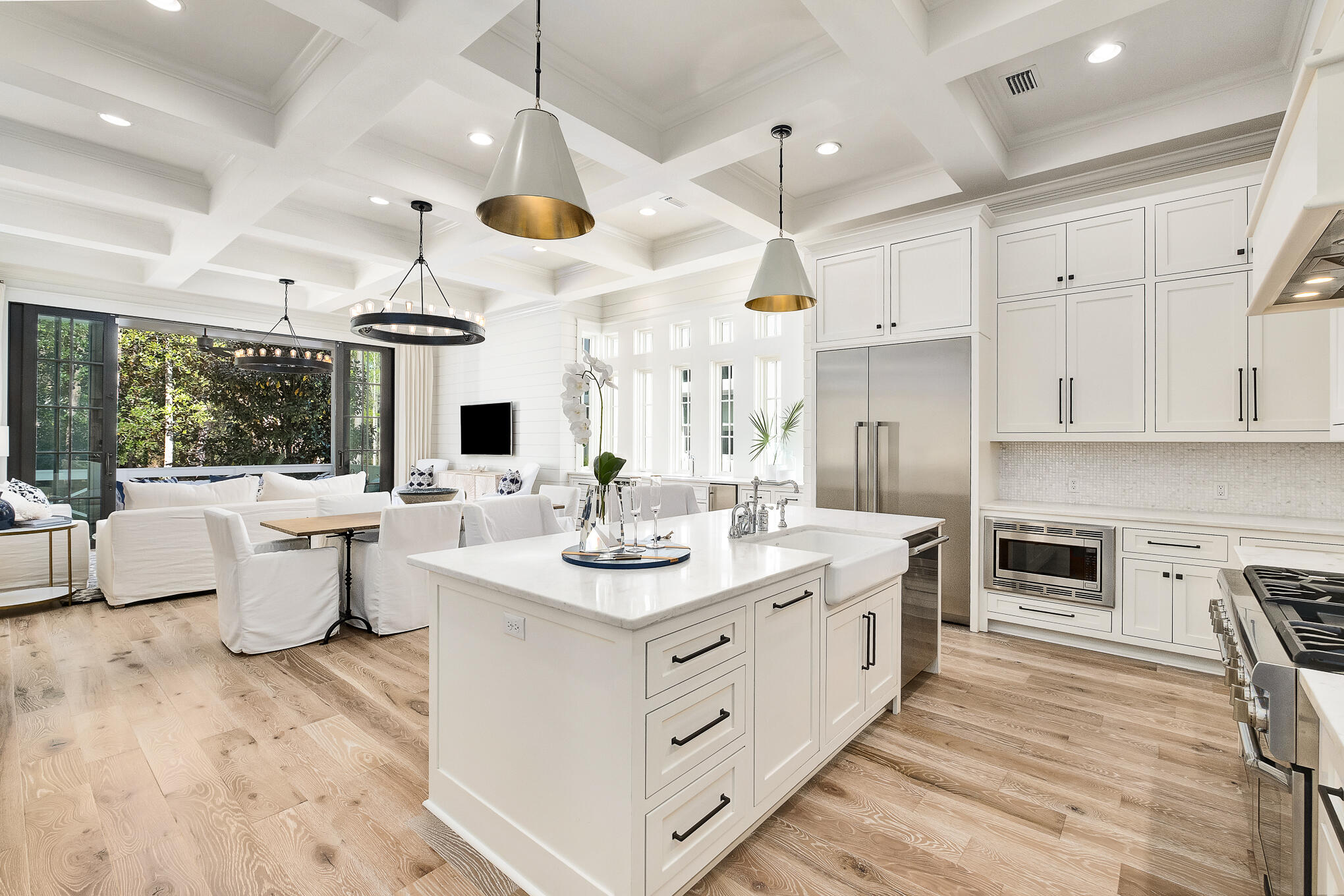 29 Bennett Santa Rosa Beach, FL 32459 - Photo 19 of 78 a large white kitchen with a large island oven a stove and a sink with large countertops
