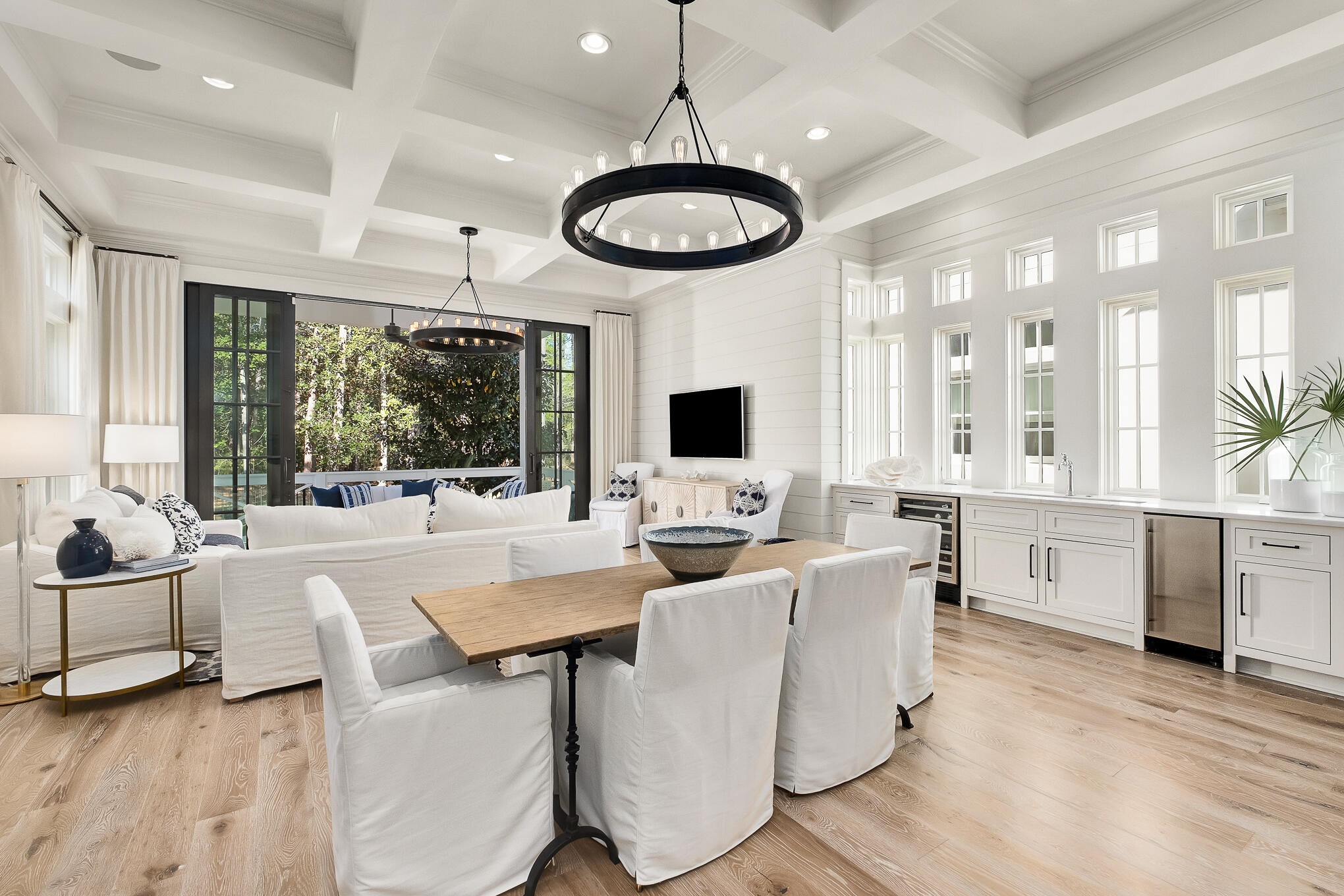 29 Bennett Santa Rosa Beach, FL 32459 - Photo 22 of 78 a living room with furniture a flat screen tv and a large window