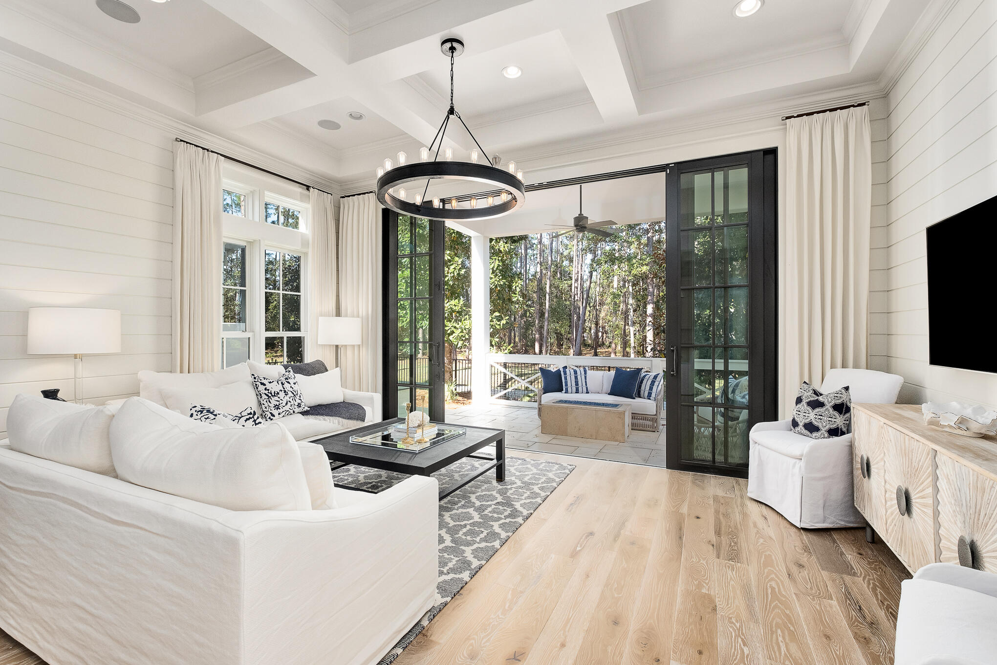 29 Bennett Santa Rosa Beach, FL 32459 - Photo 28 of 78 a living room with furniture and a chandelier