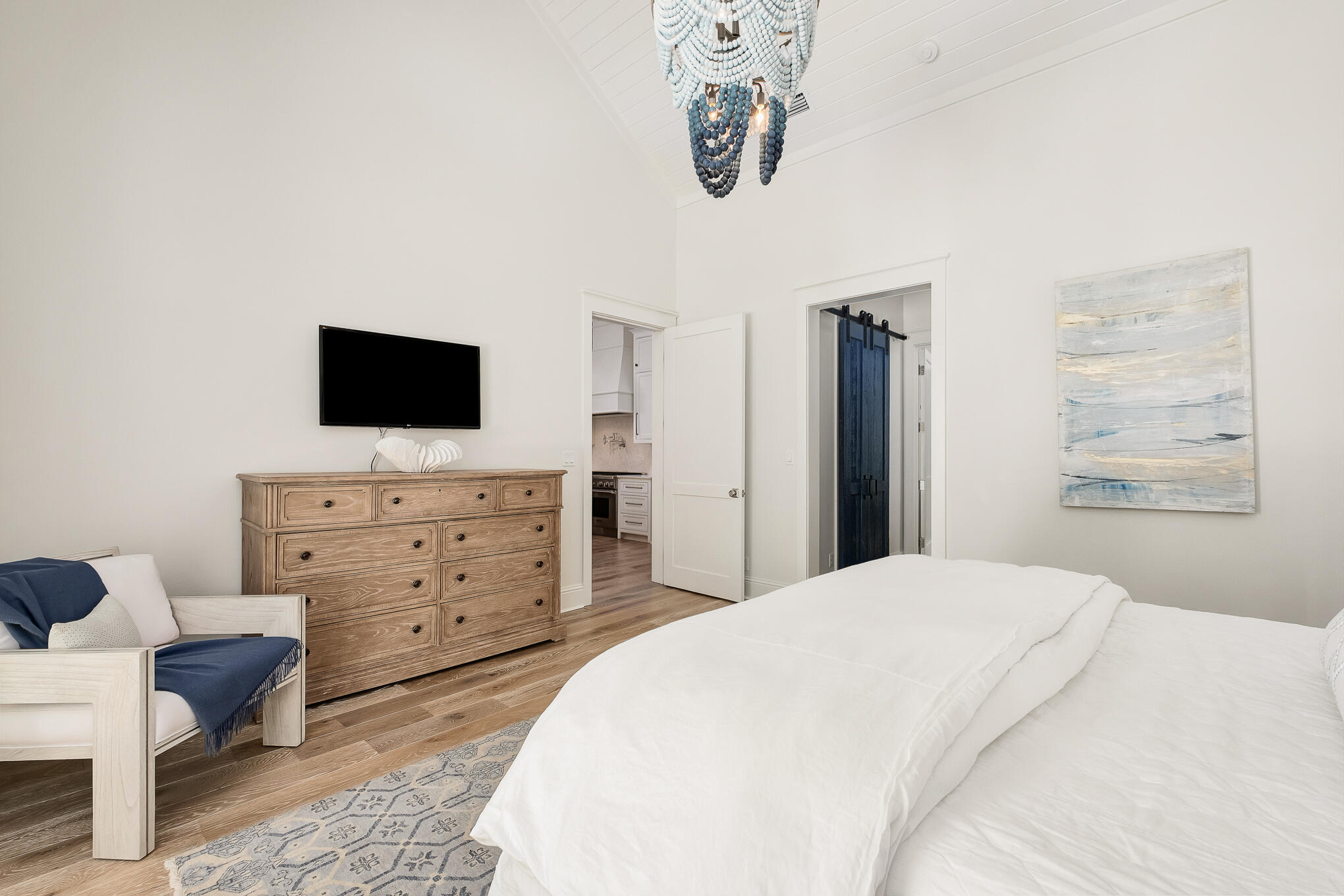 29 Bennett Santa Rosa Beach, FL 32459 - Photo 40 of 78 a bedroom with a bed and a flat screen tv