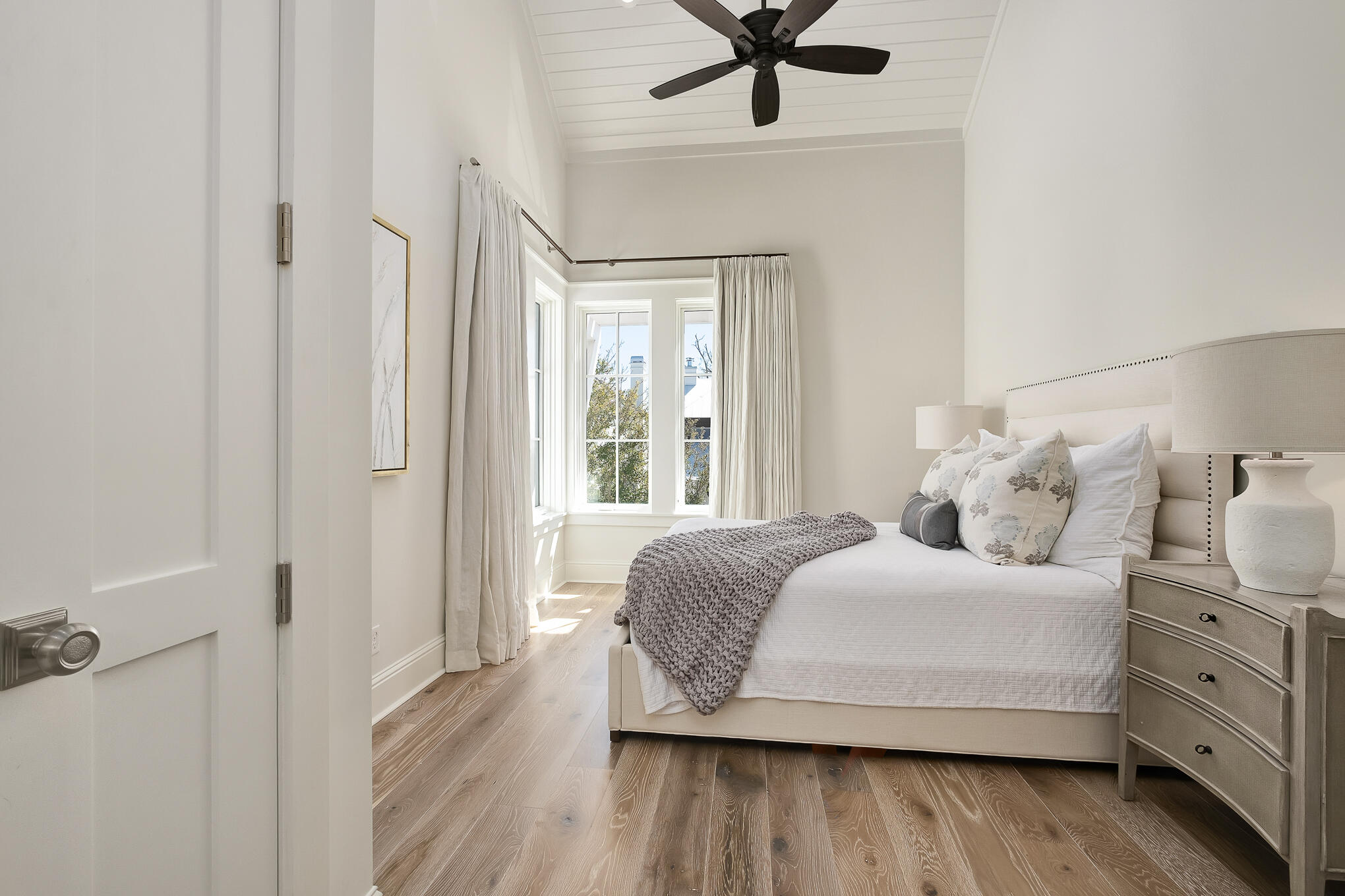 29 Bennett Santa Rosa Beach, FL 32459 - Photo 62 of 78 a bedroom with a bed and wooden floor