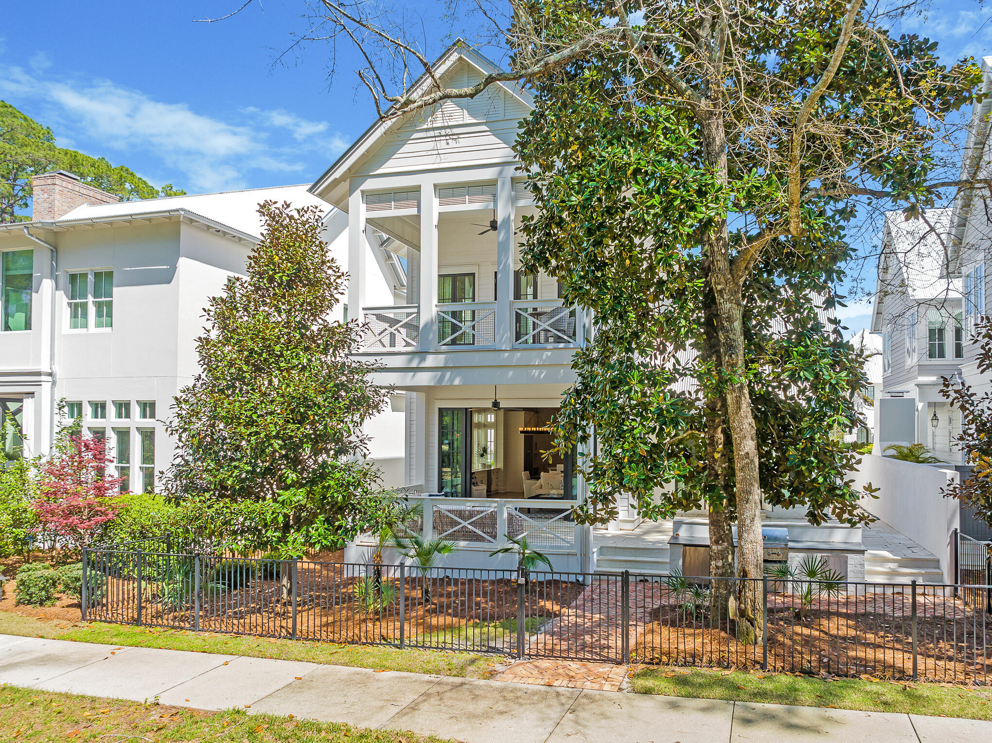 29 Bennett Santa Rosa Beach, FL 32459 - Photo 69 of 78 a front view of a house with a garden