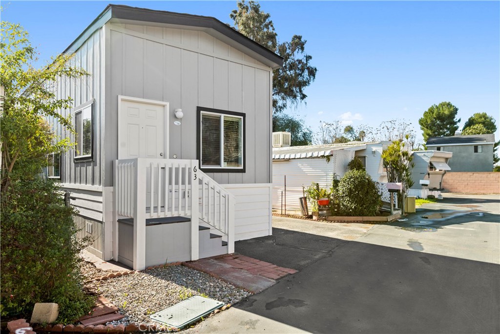 4849 Peck Road, Unit 63 El Monte, CA 91732 - Photo 1 of 1 a view of a house with a yard
