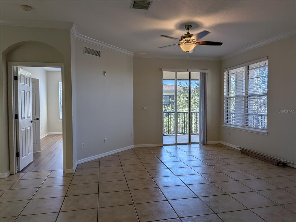 8156 Boat Hook Loop, Unit 303 Windermere, FL 34786 - Photo 7 of 26 a view of an empty room with a window