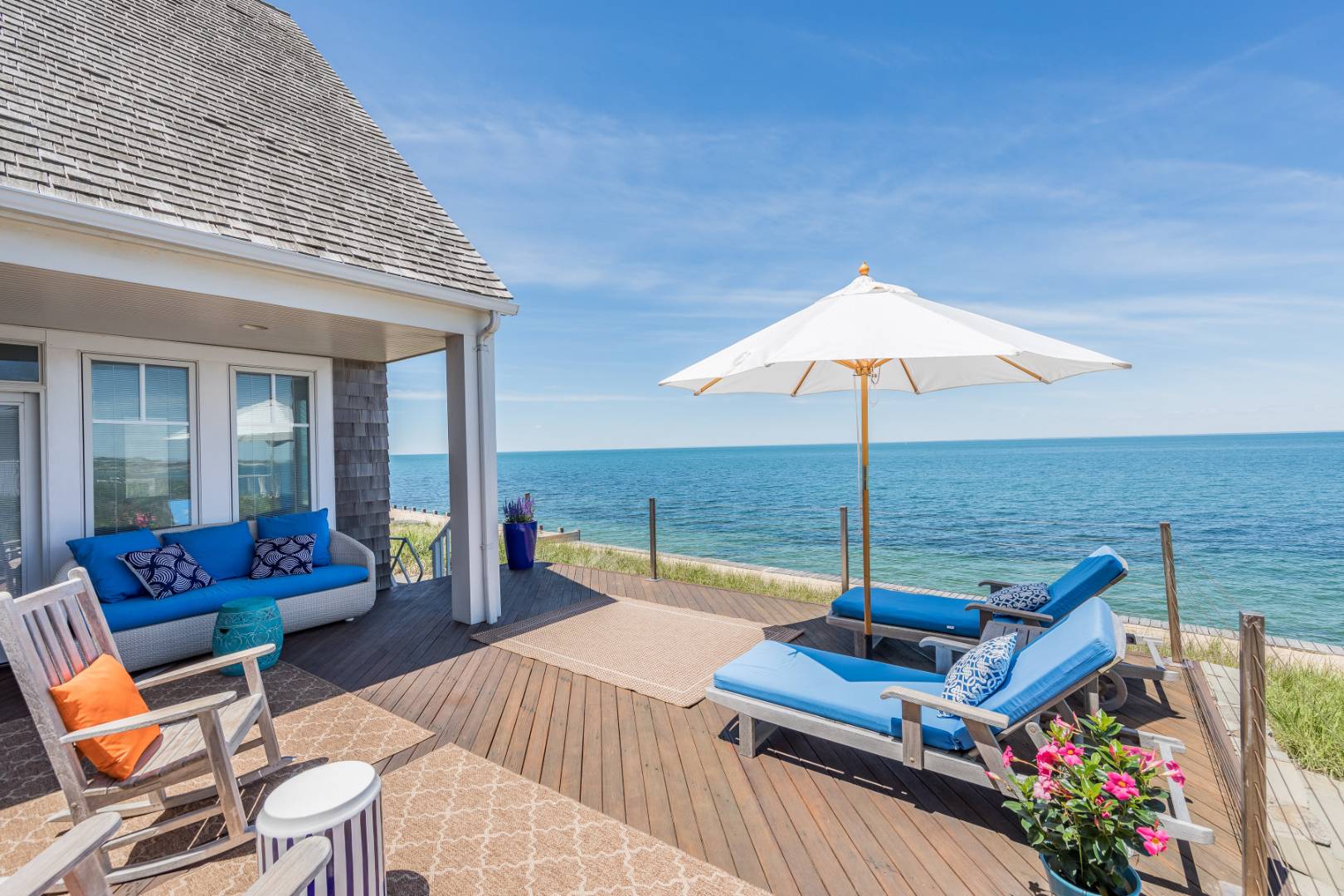 32 Captain Kidds Path Montauk, NY 11954 - Photo 2 of 25 a table and chairs in the patio