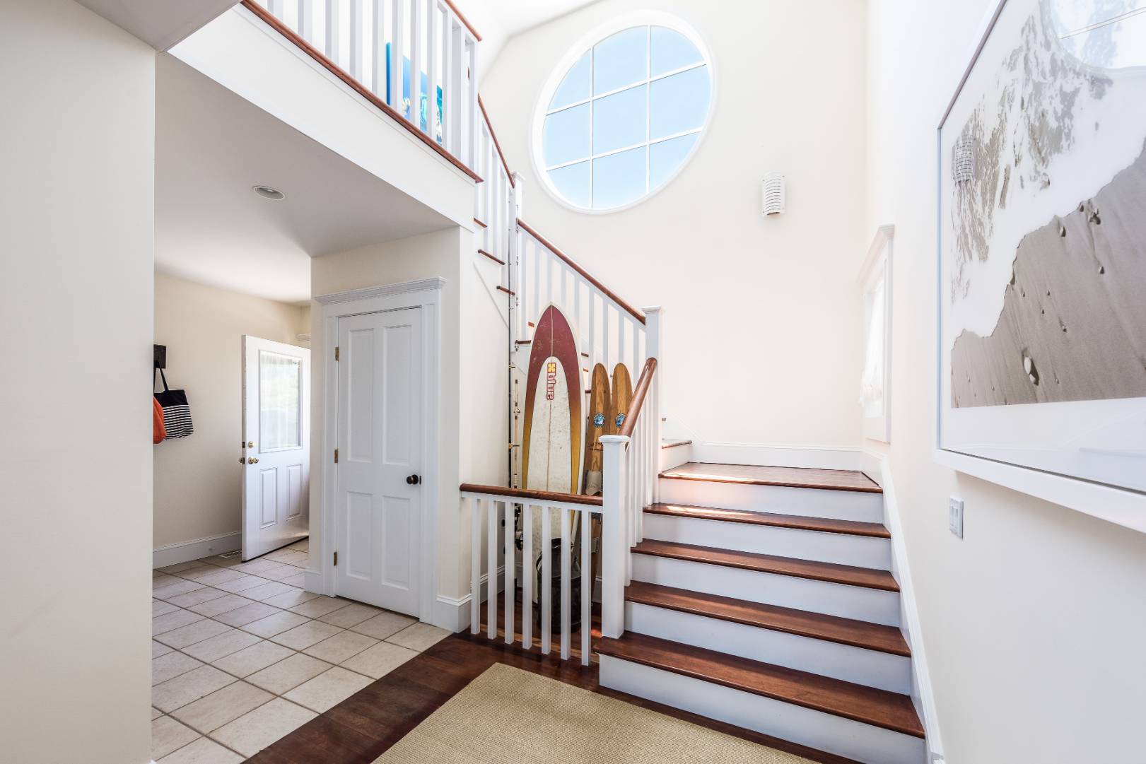 32 Captain Kidds Path Montauk, NY 11954 - Photo 21 of 25 a view of entryway with wooden floor and stairs