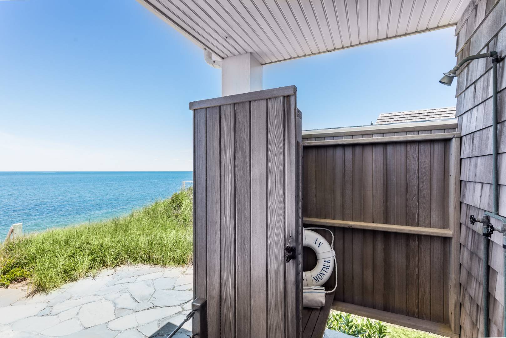 32 Captain Kidds Path Montauk, NY 11954 - Photo 22 of 25 a view of balcony with floor to ceiling window and outdoor space
