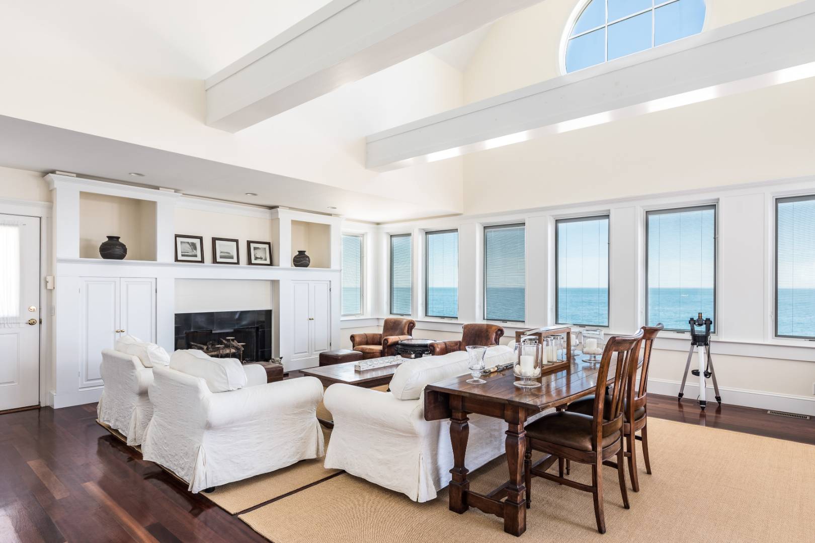 32 Captain Kidds Path Montauk, NY 11954 - Photo 6 of 25 a living room with furniture and a fireplace