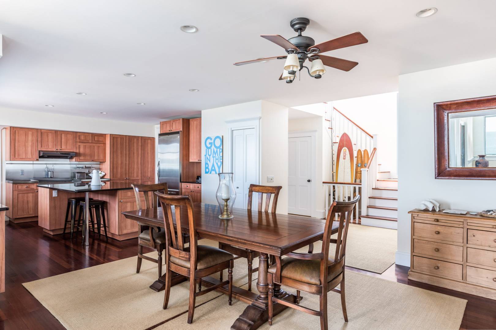 32 Captain Kidds Path Montauk, NY 11954 - Photo 9 of 25 a view of a dining room with furniture and wooden floor