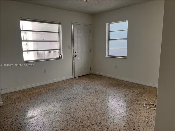 an empty room with a window