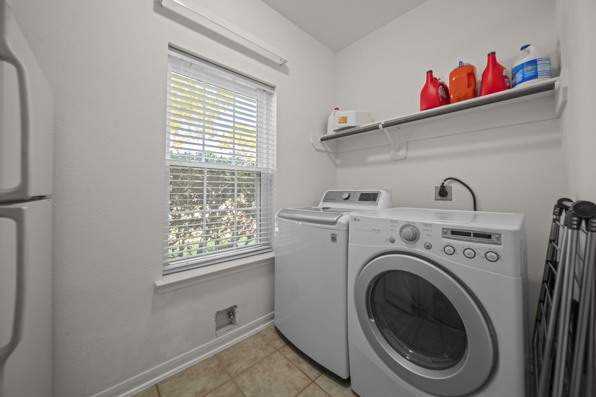 20727 Shadow Mill Court Katy, TX 77450 - Photo 12 of 48 a utility room with dryer and washer