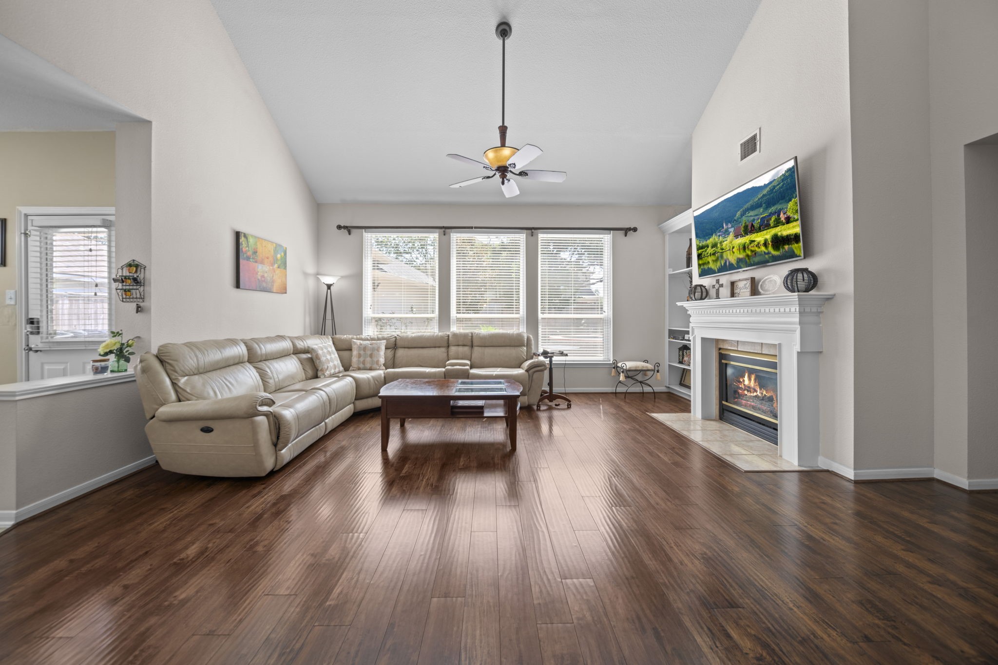 20727 Shadow Mill Court Katy, TX 77450 - Photo 17 of 48 a living room with furniture and a fireplace