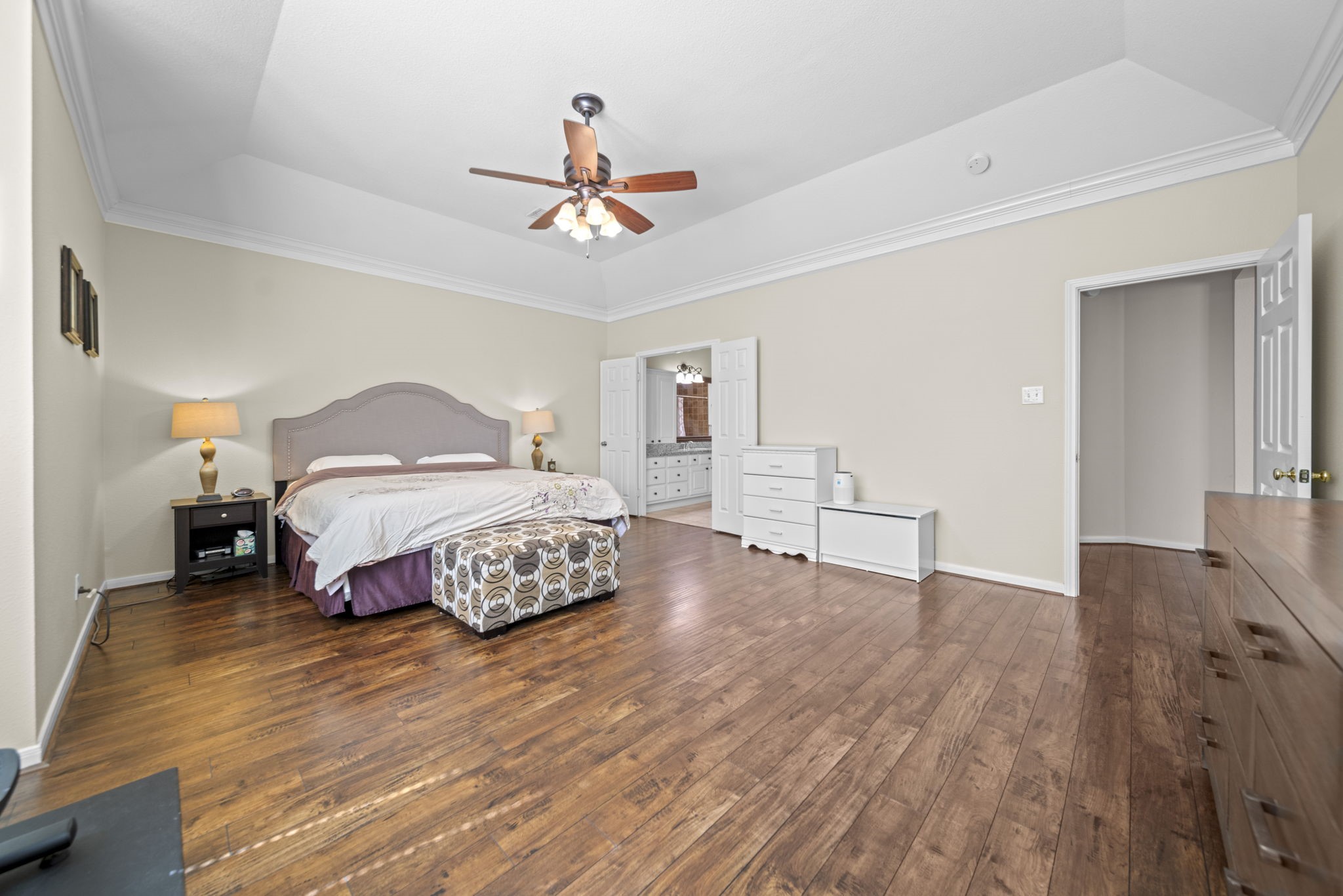 20727 Shadow Mill Court Katy, TX 77450 - Photo 22 of 48 a bedroom with a bed and wooden floor