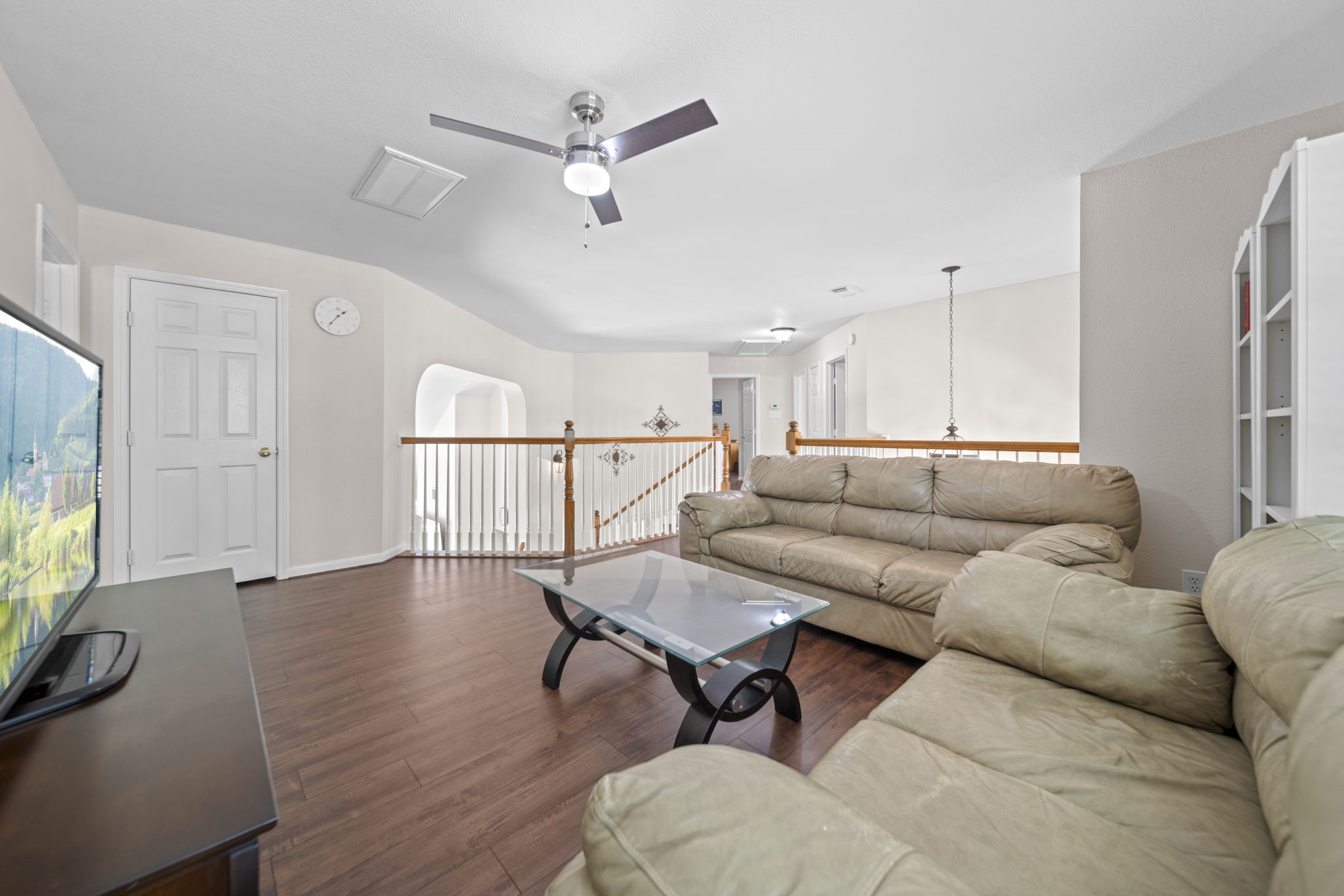 20727 Shadow Mill Court Katy, TX 77450 - Photo 28 of 48 a living room with furniture and a flat screen tv