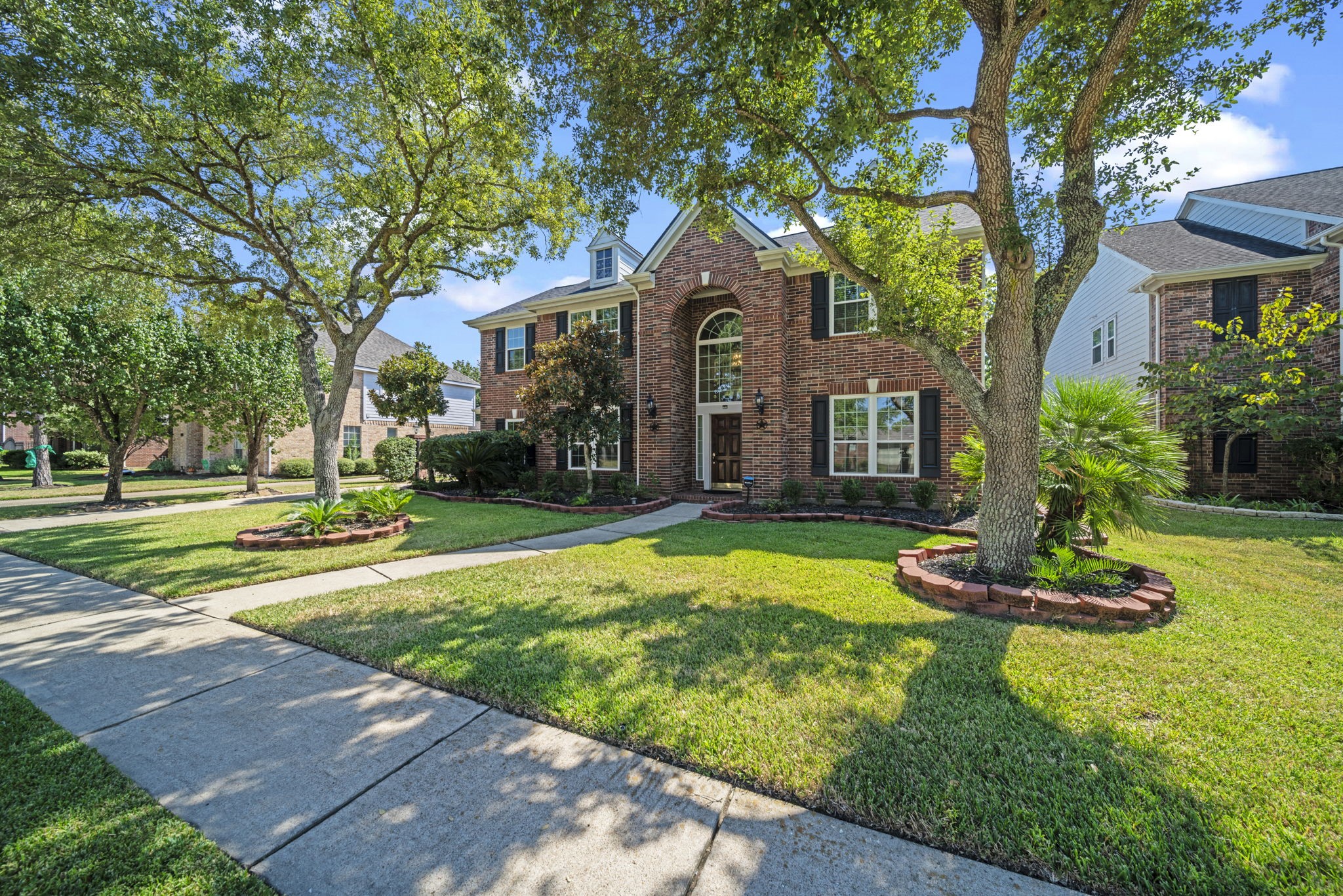 20727 Shadow Mill Court Katy, TX 77450 - Photo 3 of 48 a front view of a house with a yard