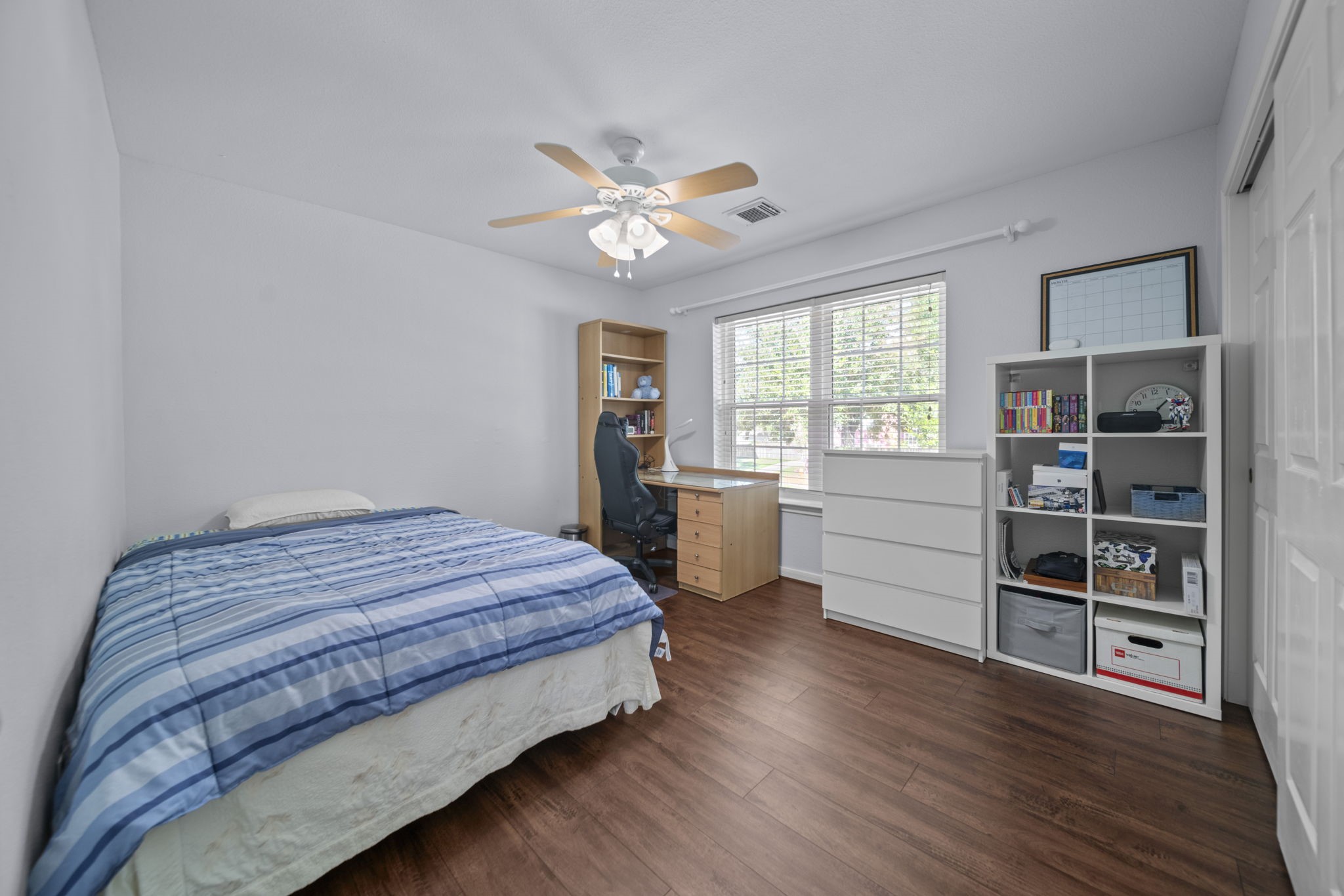 20727 Shadow Mill Court Katy, TX 77450 - Photo 32 of 48 a bedroom with a bed and a window