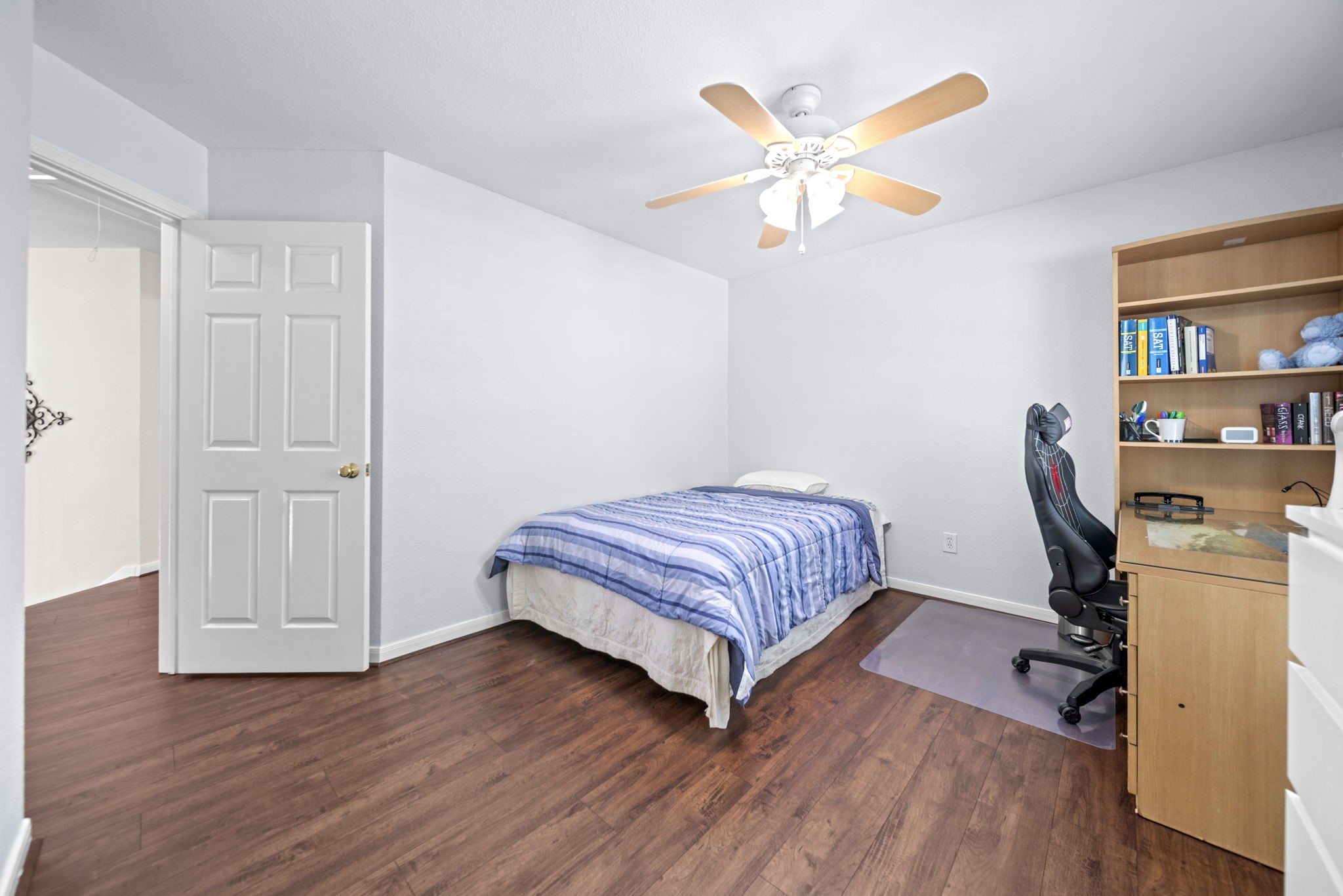 20727 Shadow Mill Court Katy, TX 77450 - Photo 33 of 48 a bedroom with a bed and wooden floor