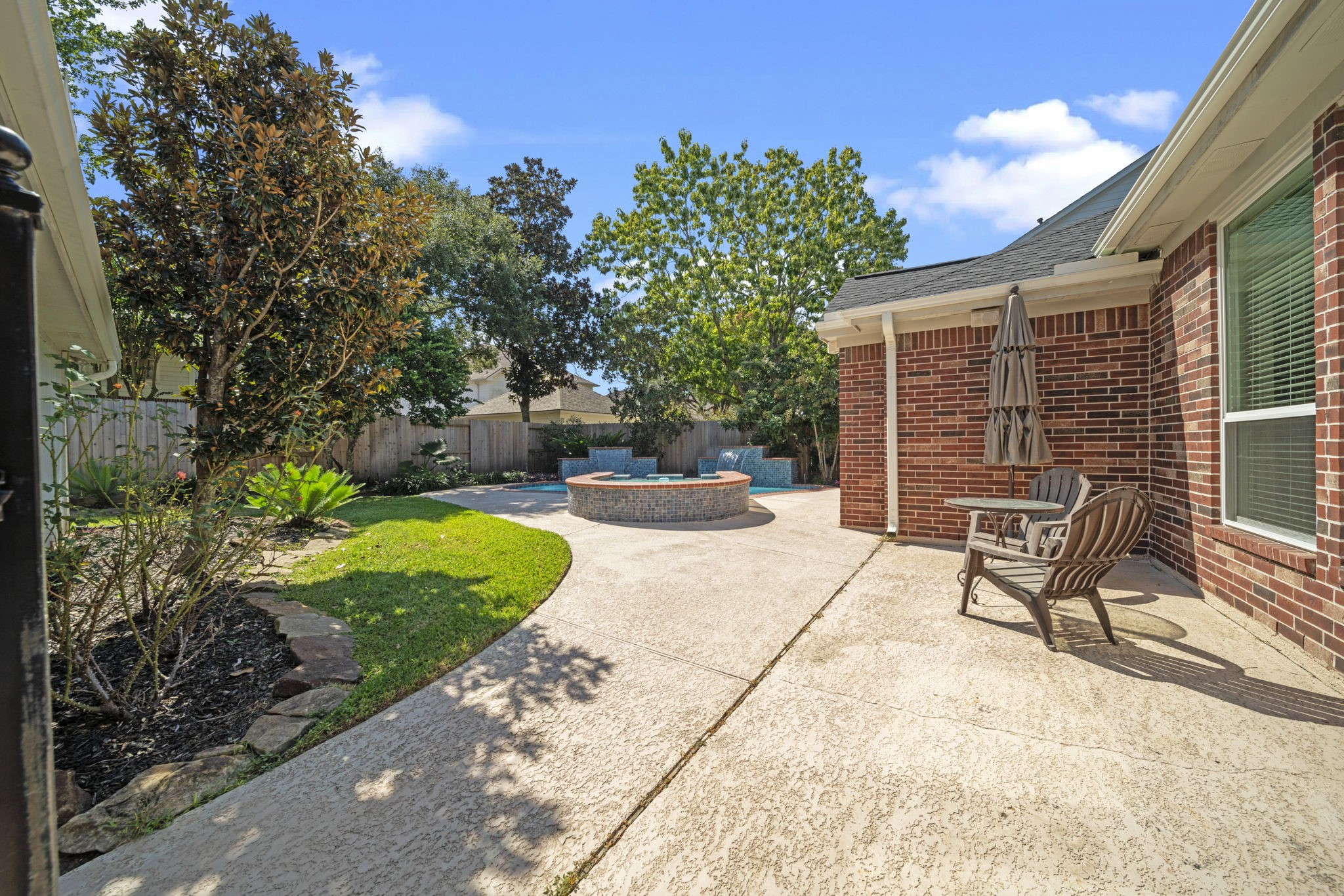 20727 Shadow Mill Court Katy, TX 77450 - Photo 36 of 48 a view of backyard with patio