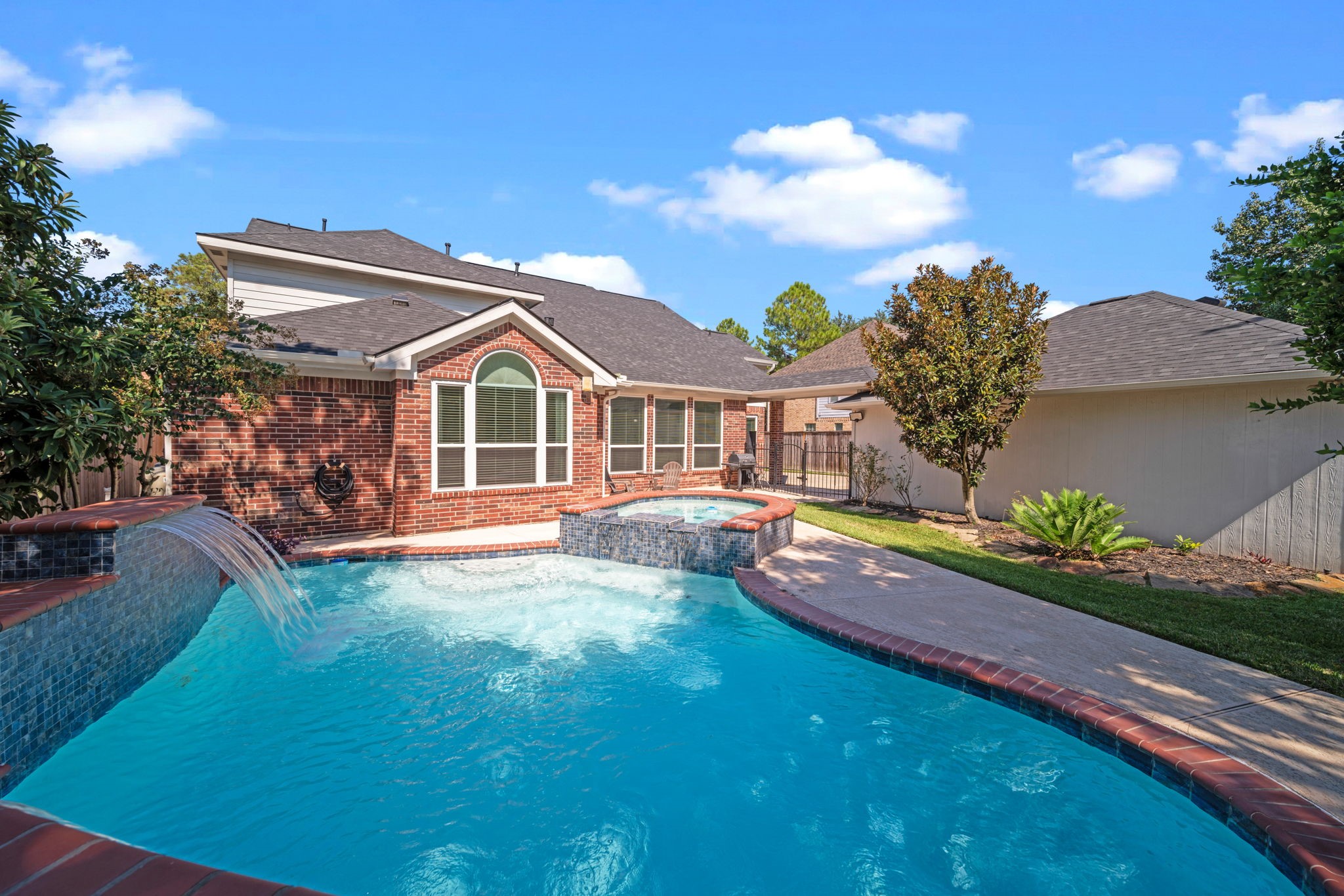20727 Shadow Mill Court Katy, TX 77450 - Photo 41 of 48 a front view of a house with garden