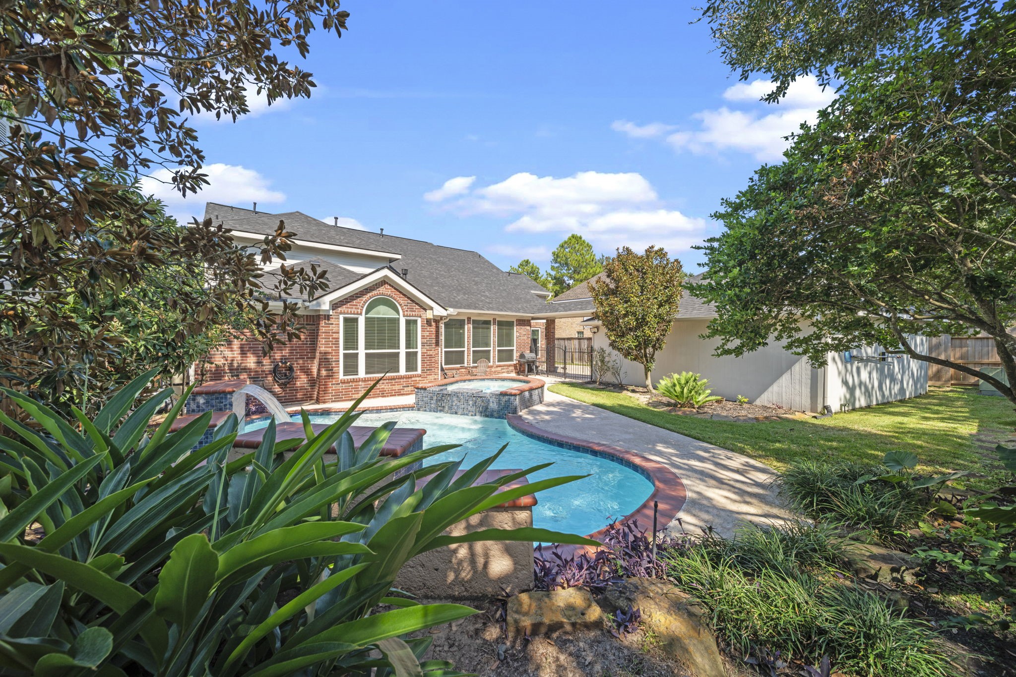 20727 Shadow Mill Court Katy, TX 77450 - Photo 42 of 48 a aerial view of a house with swimming pool lawn chairs and a fire pit