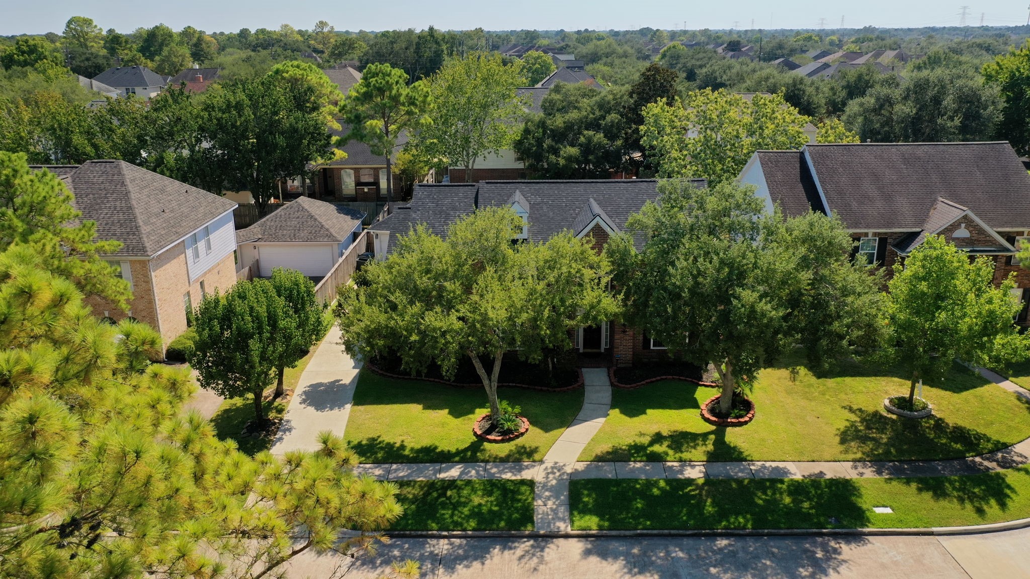 20727 Shadow Mill Court Katy, TX 77450 - Photo 46 of 48 an aerial view of a house with swimming pool patio and lake view