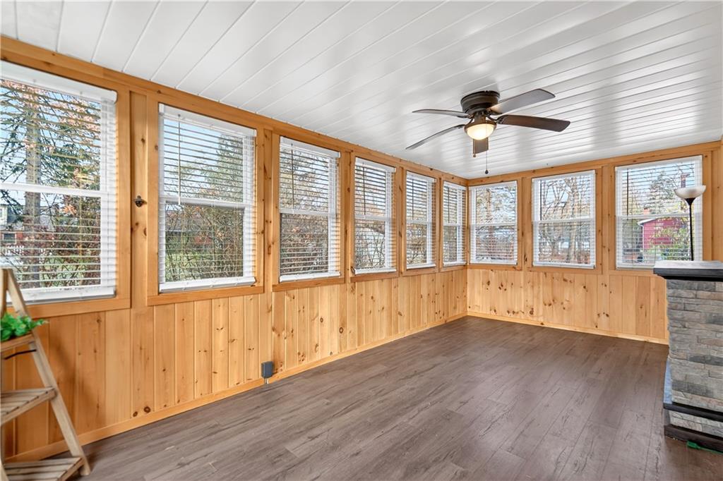 205 Hartle Road Glenshaw, PA 15116 - Photo 17 of 36 a view of an empty room with wooden floor and a window