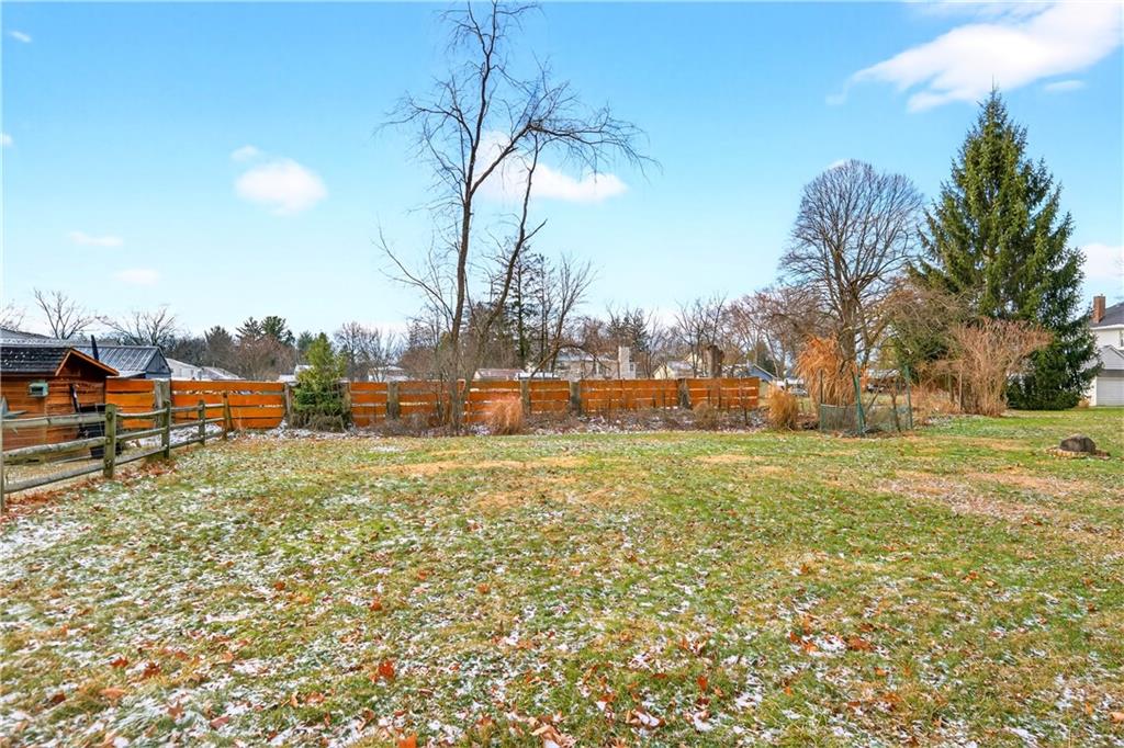 205 Hartle Road Glenshaw, PA 15116 - Photo 2 of 36 a backyard of a house with lots of green space