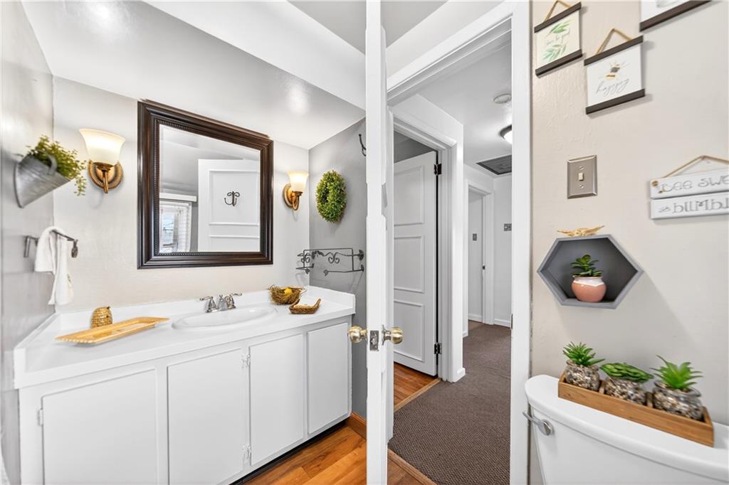 205 Hartle Road Glenshaw, PA 15116 - Photo 21 of 36 a bathroom with a sink and a mirror