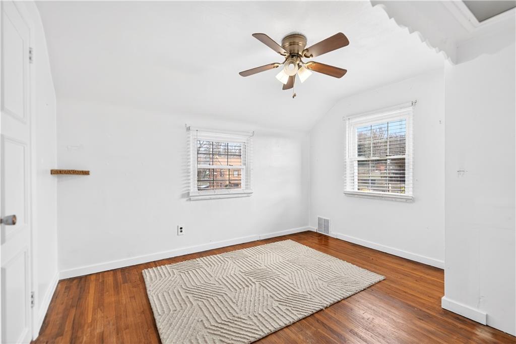 205 Hartle Road Glenshaw, PA 15116 - Photo 24 of 36 a view of a room with wooden floor and window
