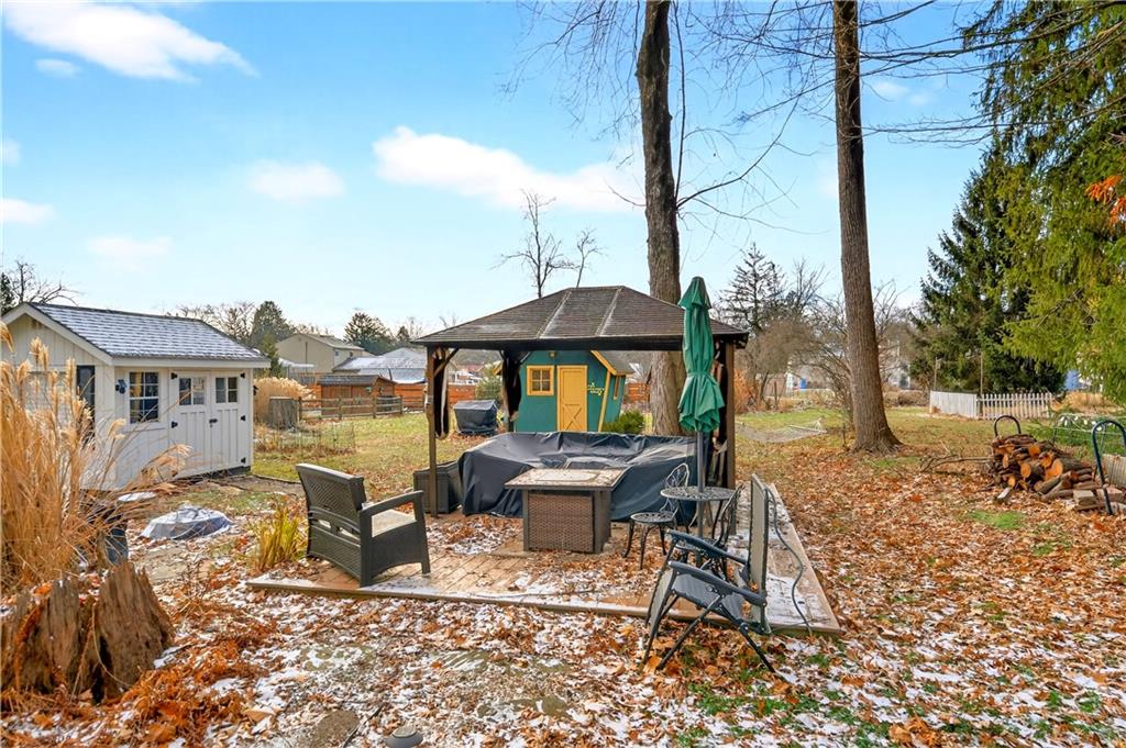 205 Hartle Road Glenshaw, PA 15116 - Photo 32 of 36 a view of a house with backyard porch and sitting area