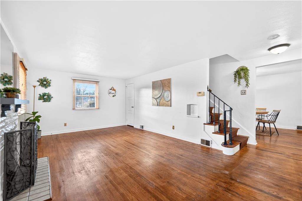 205 Hartle Road Glenshaw, PA 15116 - Photo 5 of 36 a view of empty room with wooden floor