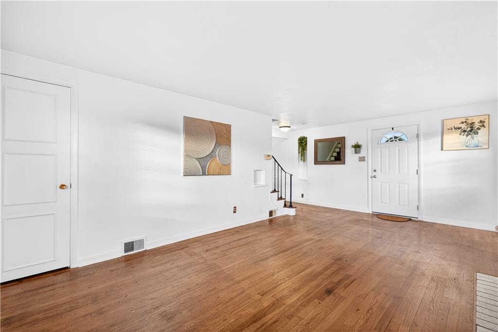 205 Hartle Road Glenshaw, PA 15116 - Photo 6 of 36 a view of empty room with wooden floor