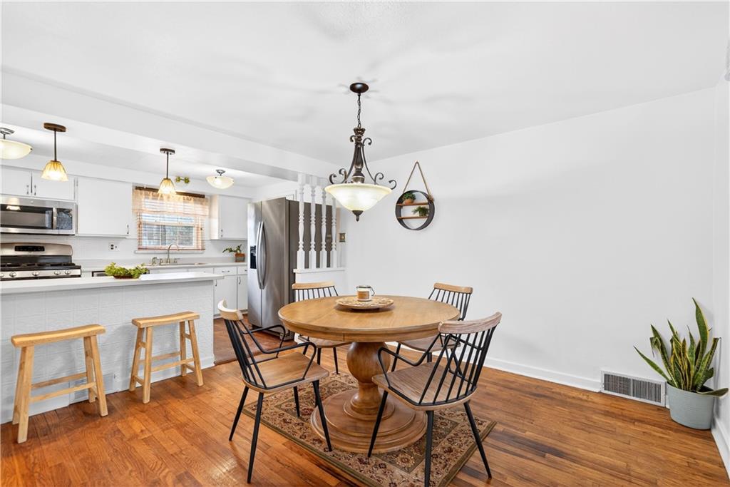 205 Hartle Road Glenshaw, PA 15116 - Photo 9 of 36 a dining room with a table and chairs