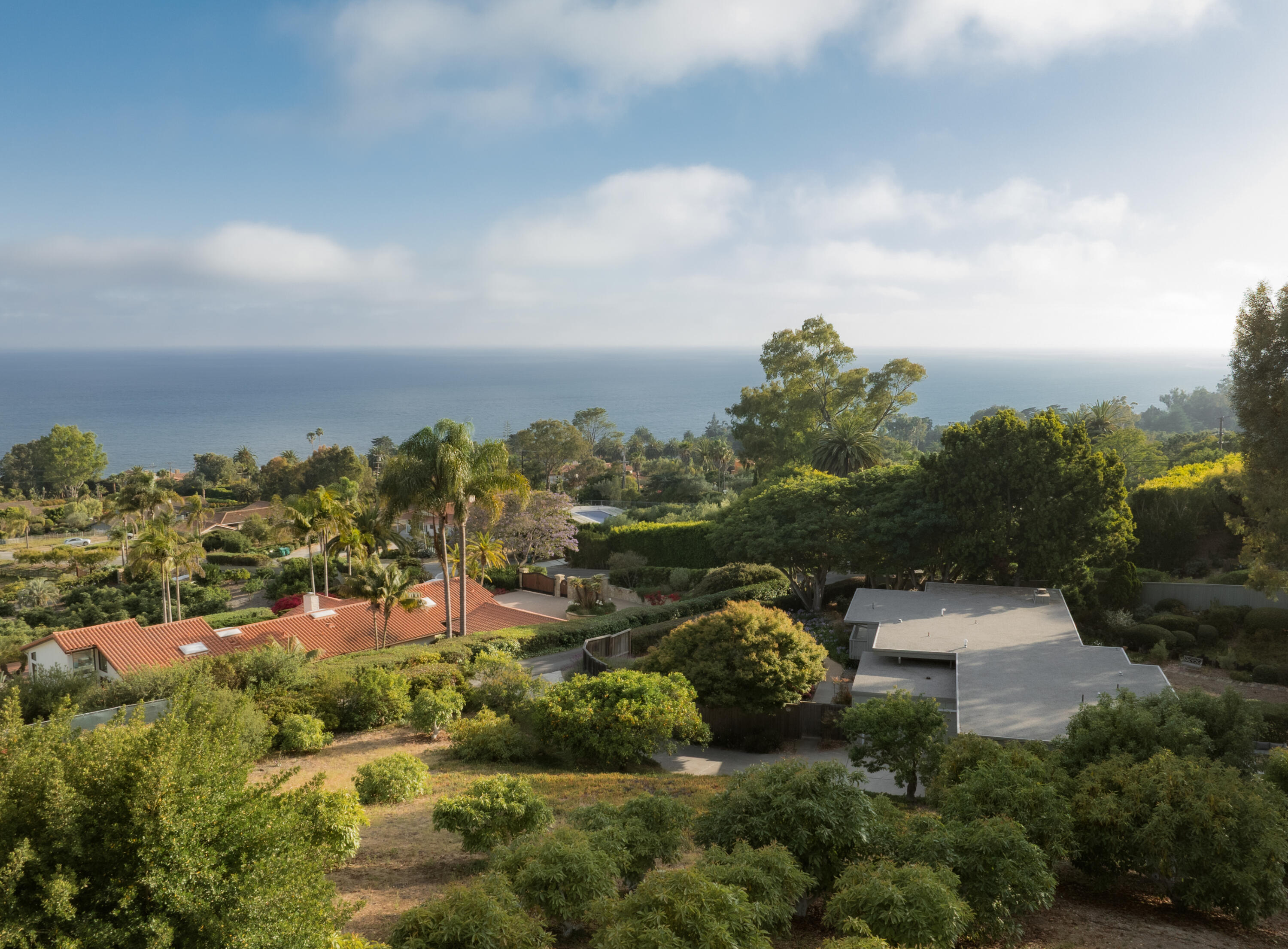 626 Sea Ranch Drive Santa Barbara, CA 93109 - Photo 1 of 38 an aerial view of residential house with green space and fog