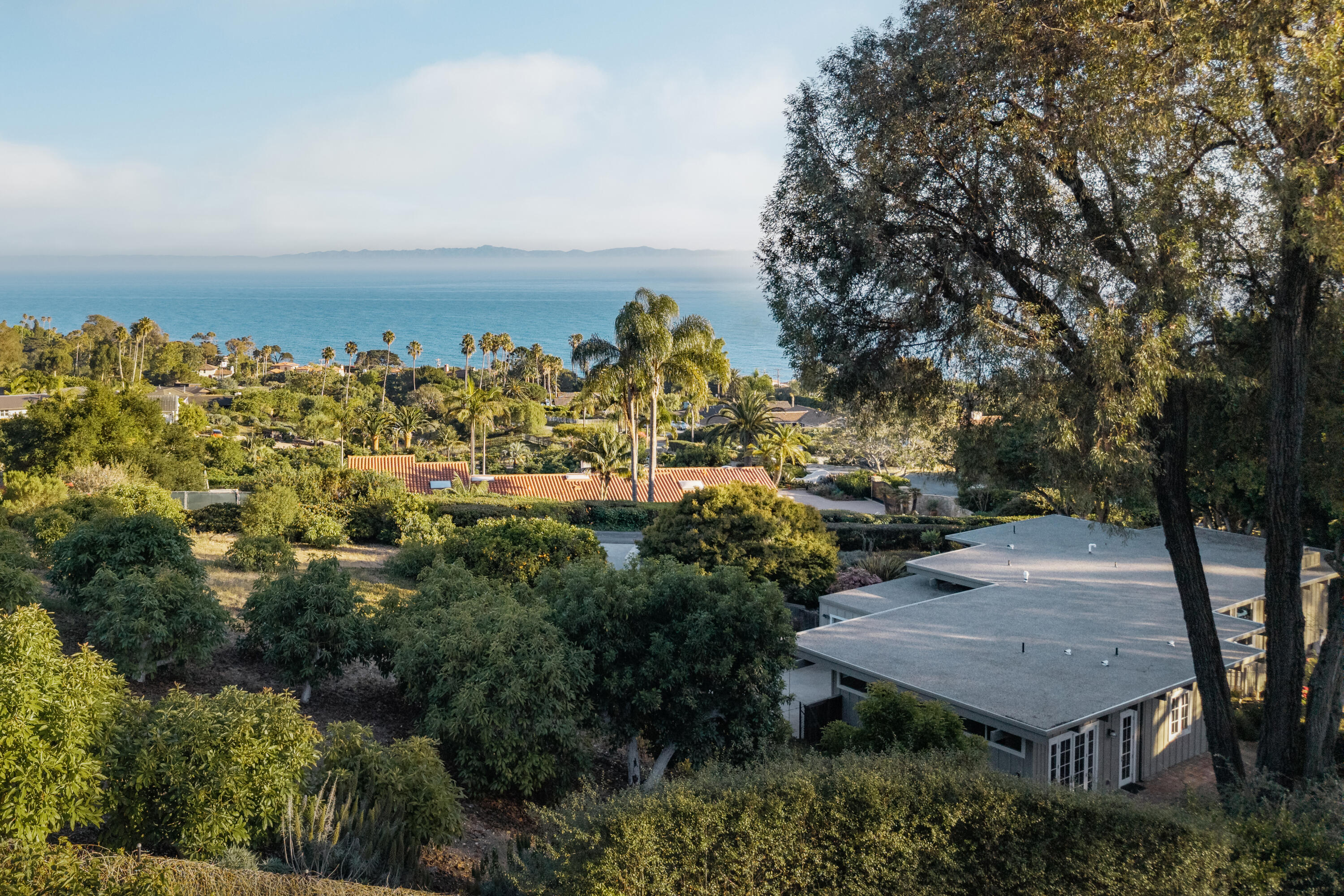626 Sea Ranch Drive Santa Barbara, CA 93109 - Photo 13 of 38 an aerial view of a house with a yard swimming pool and outdoor seating