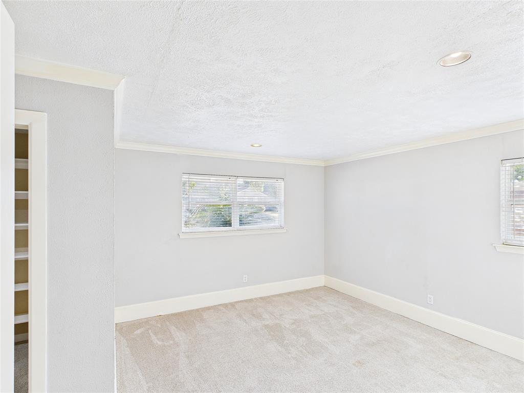 6909 Valhalla Road Fort Worth, TX 76116 - Photo 11 of 15 an empty room with a window